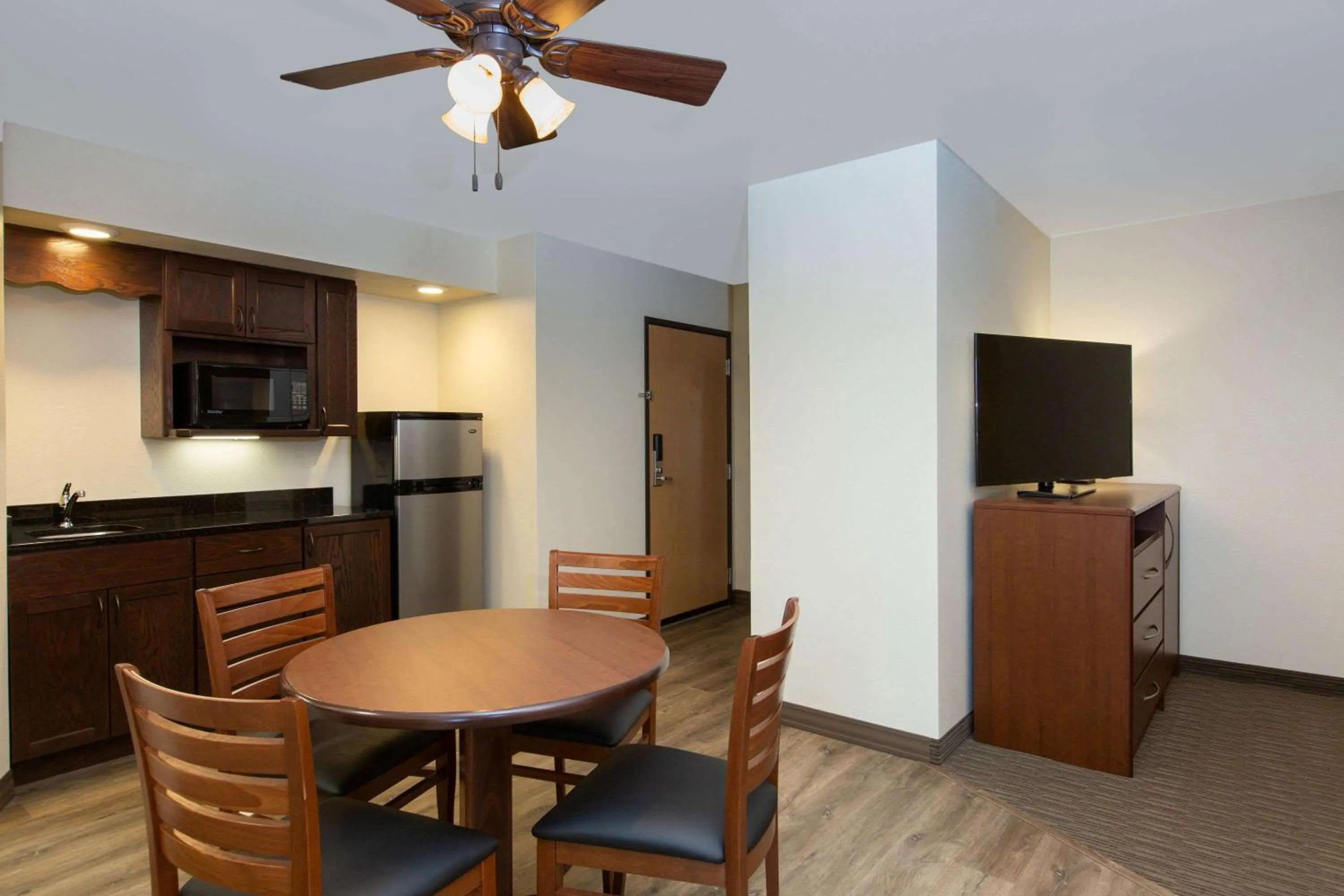 Photo of the whole room in AmericInn by Wyndham Merrill