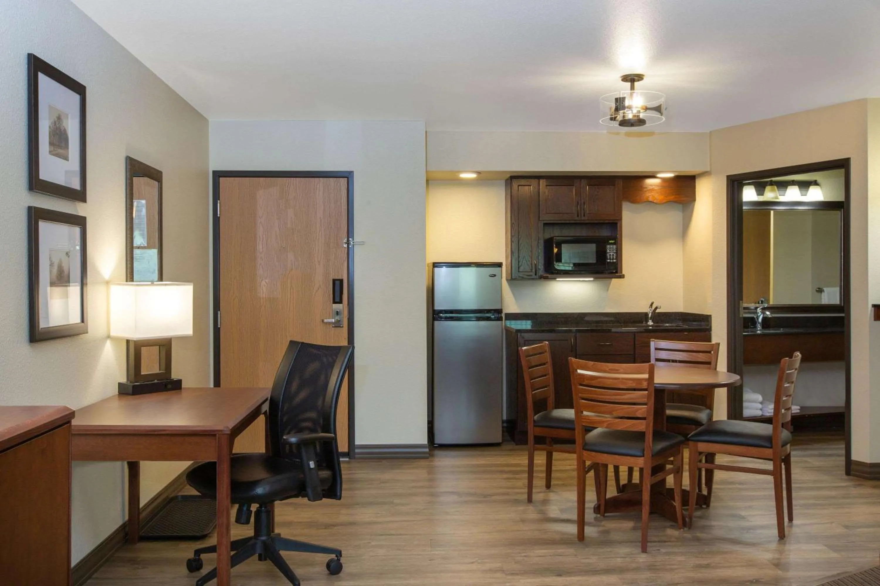 Kitchen or kitchenette in AmericInn by Wyndham Merrill