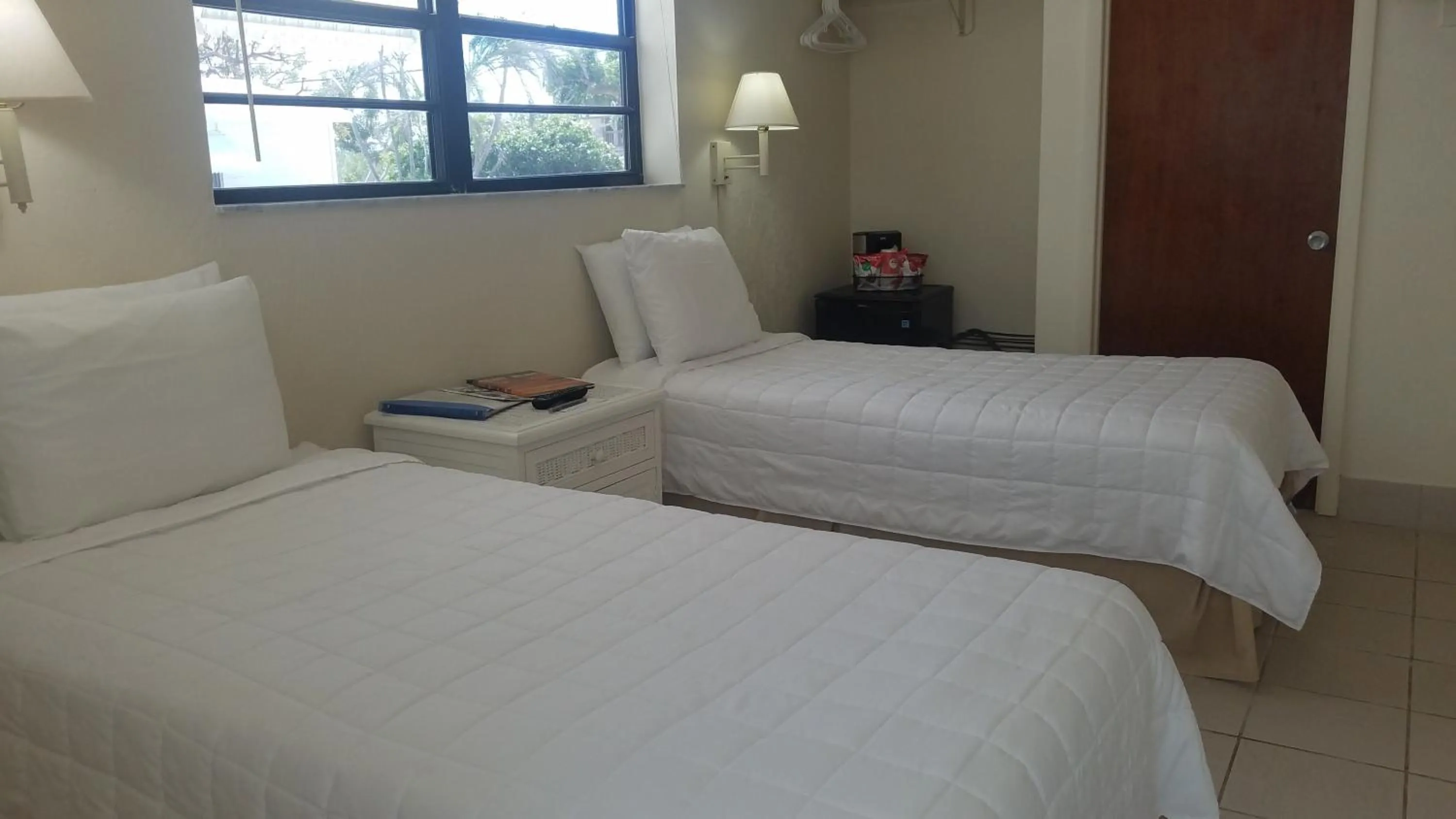 Bed in Parmer's Resort