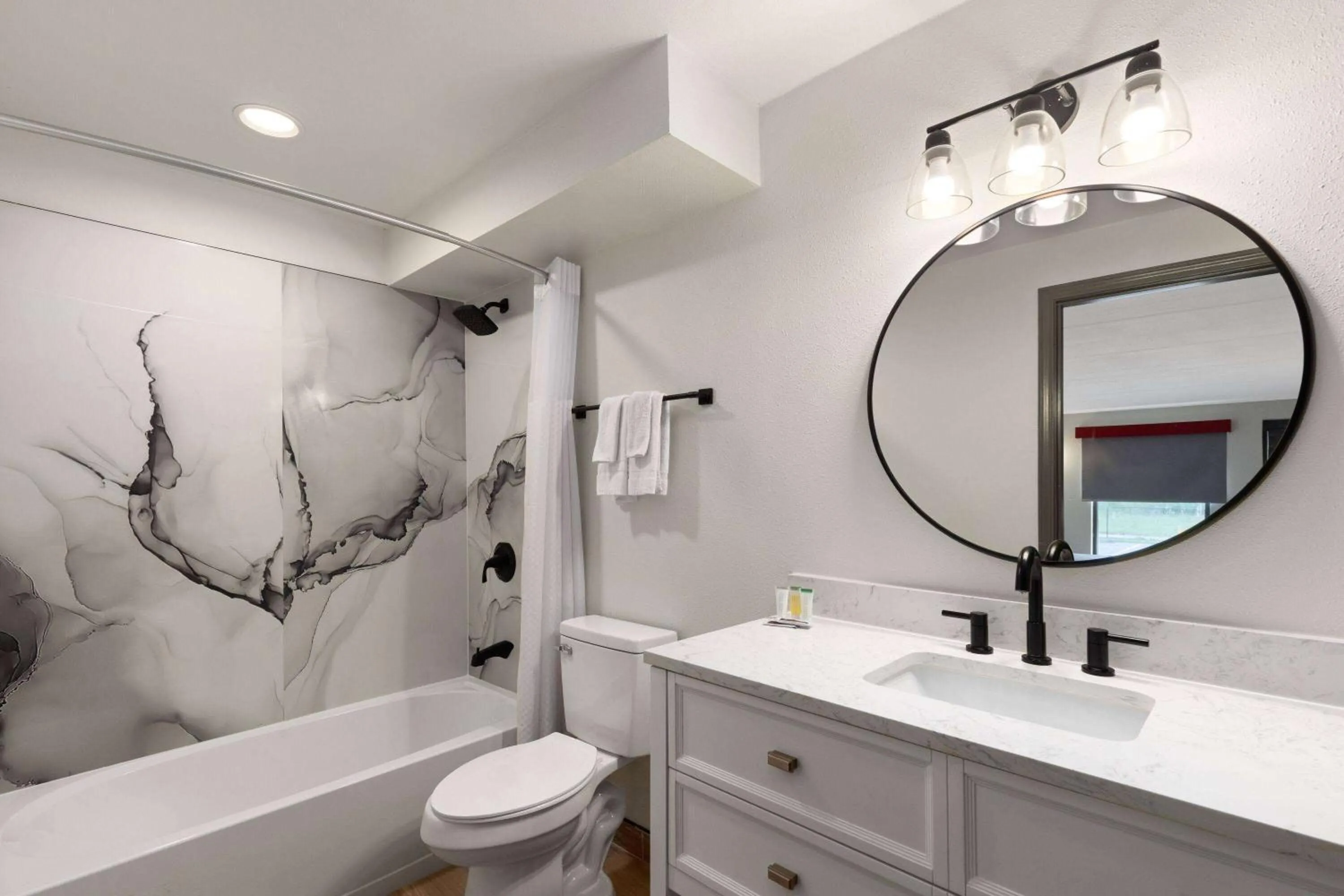 Bathroom in Ramada by Wyndham Bainbridge