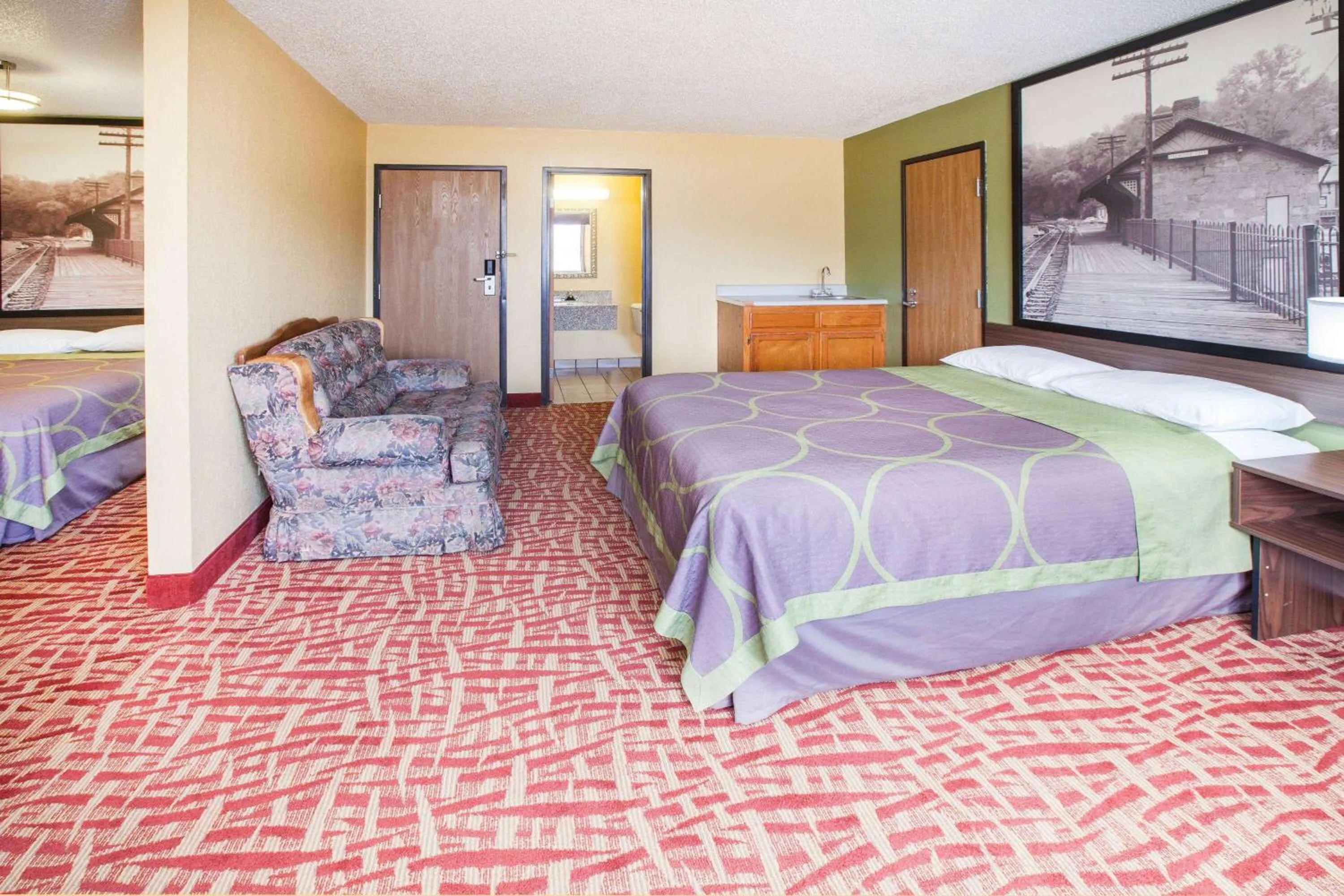 Photo of the whole room, Bed in Super 8 by Wyndham Van Buren/Ft. Smith Area