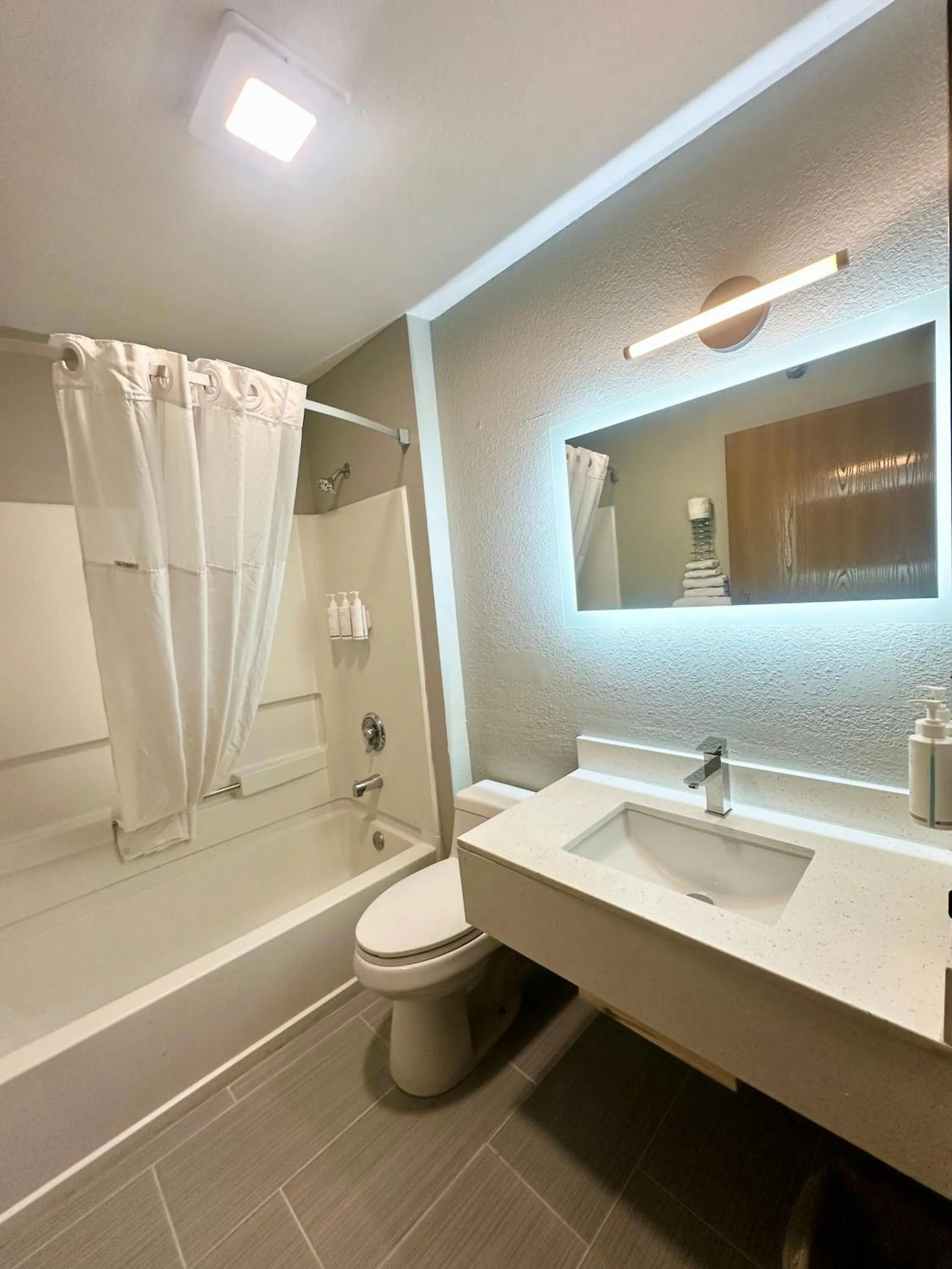 Bathroom in Super 8 by Wyndham Warrenton