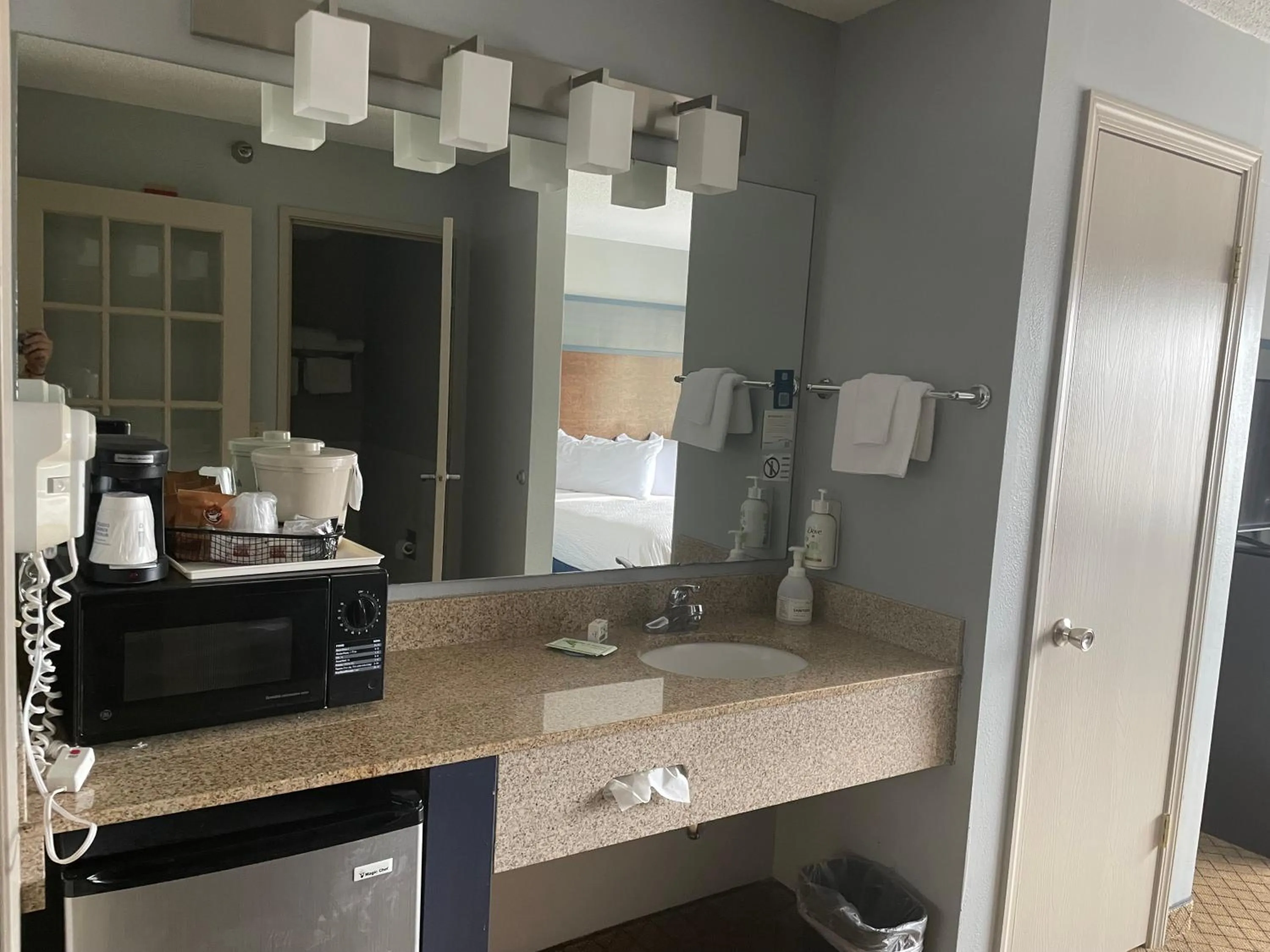 Bathroom in AmericInn by Wyndham Hartford WI