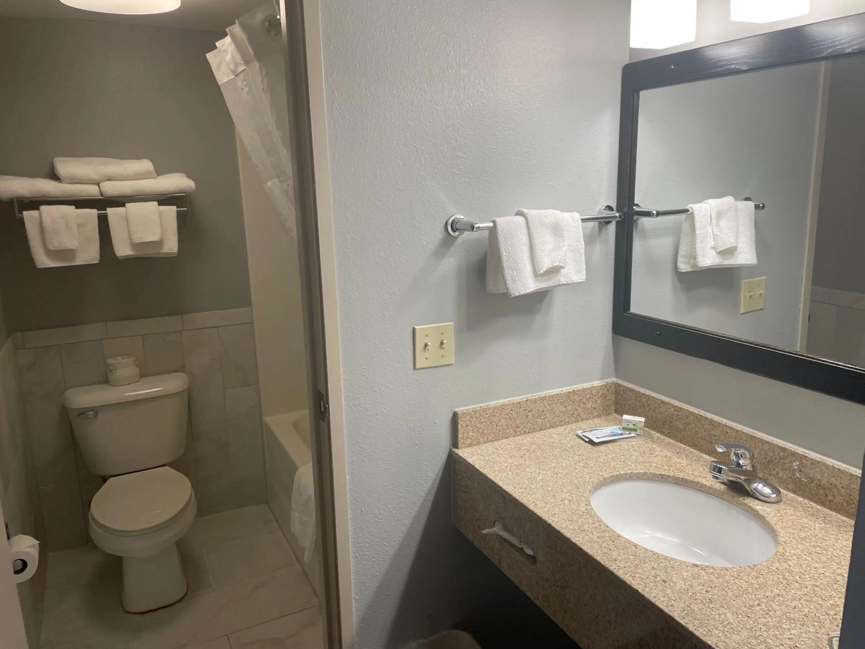 Bathroom in AmericInn by Wyndham Hartford WI