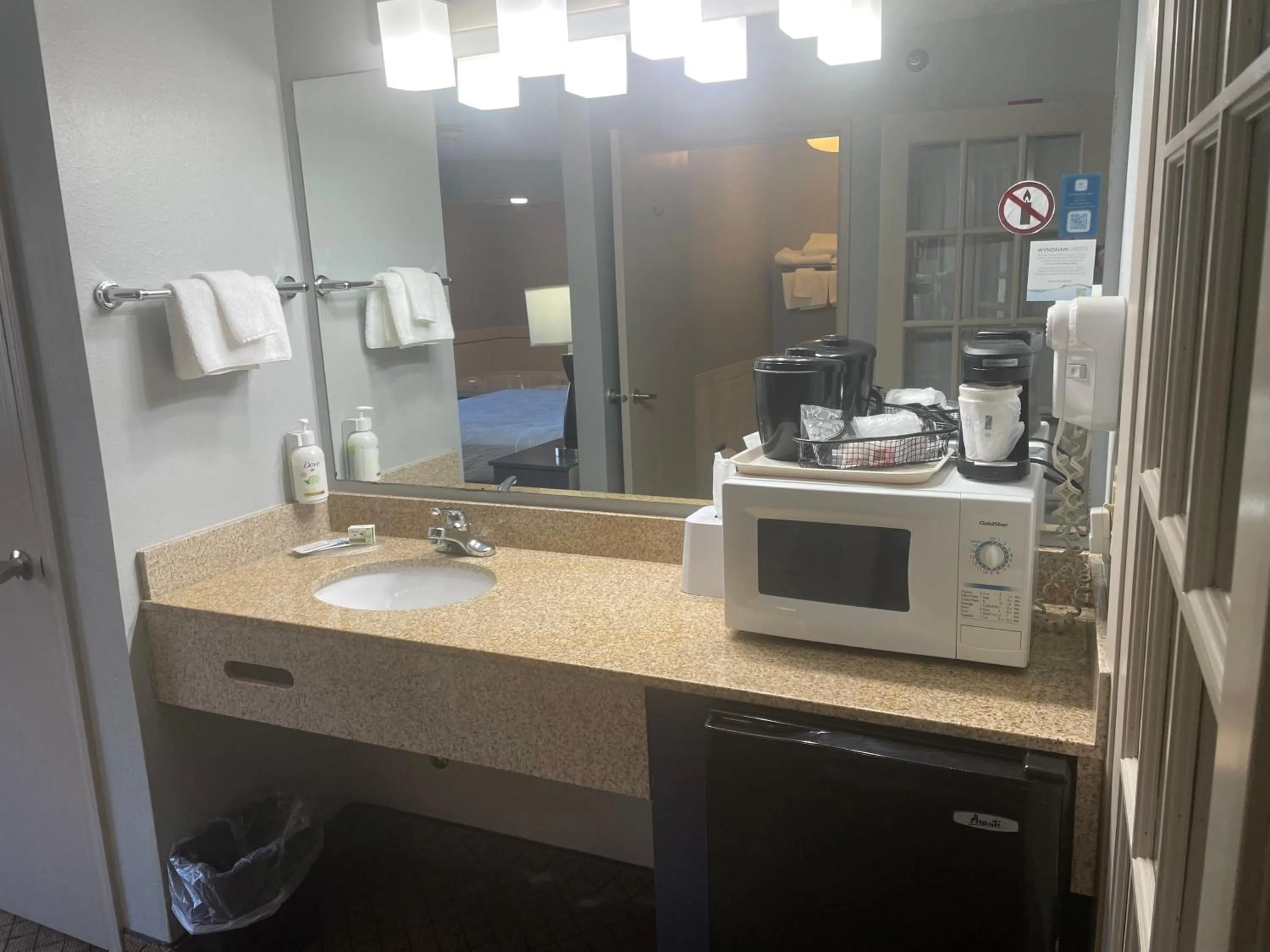 Bathroom in AmericInn by Wyndham Hartford WI