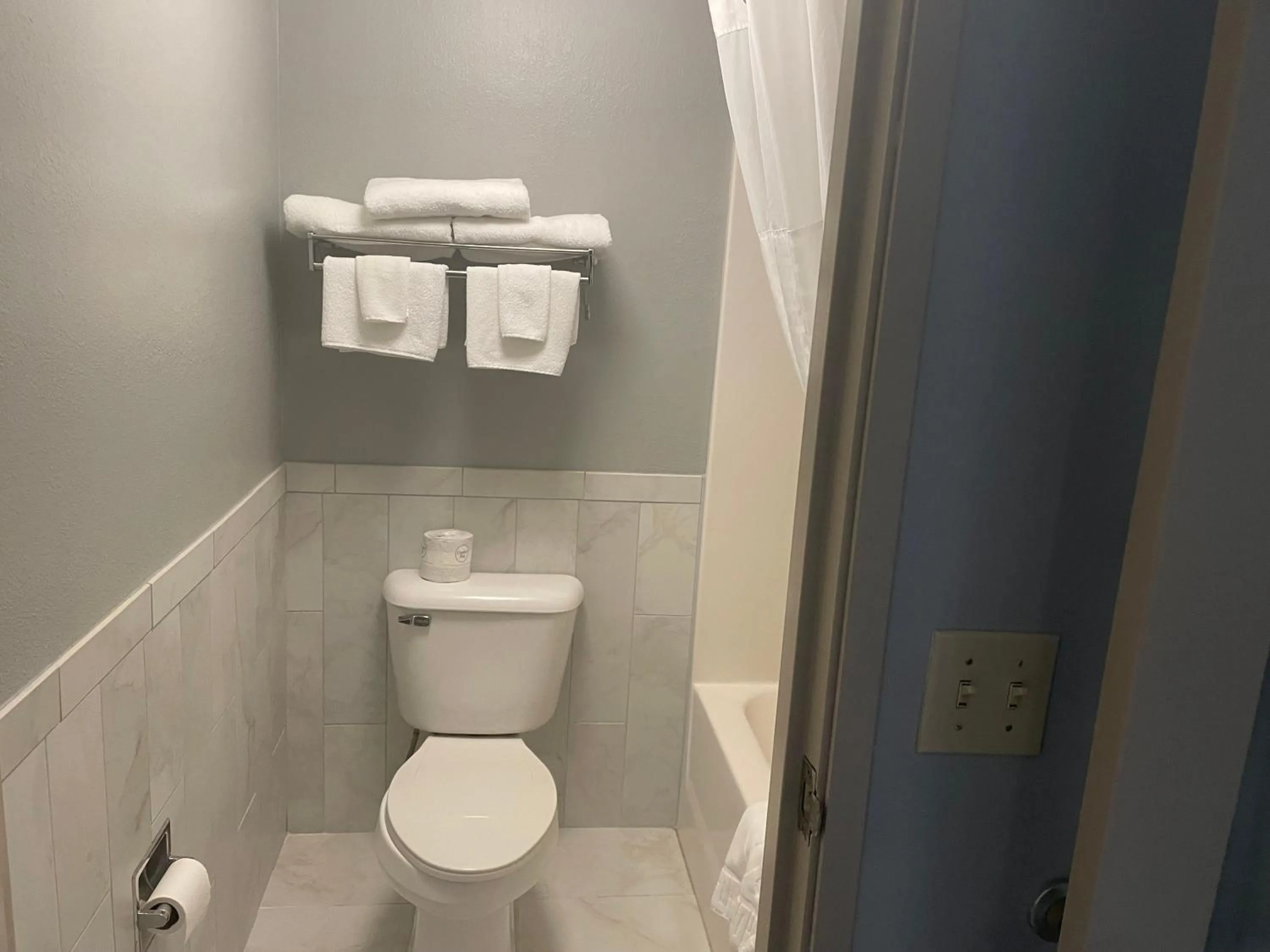 Bathroom in AmericInn by Wyndham Hartford WI