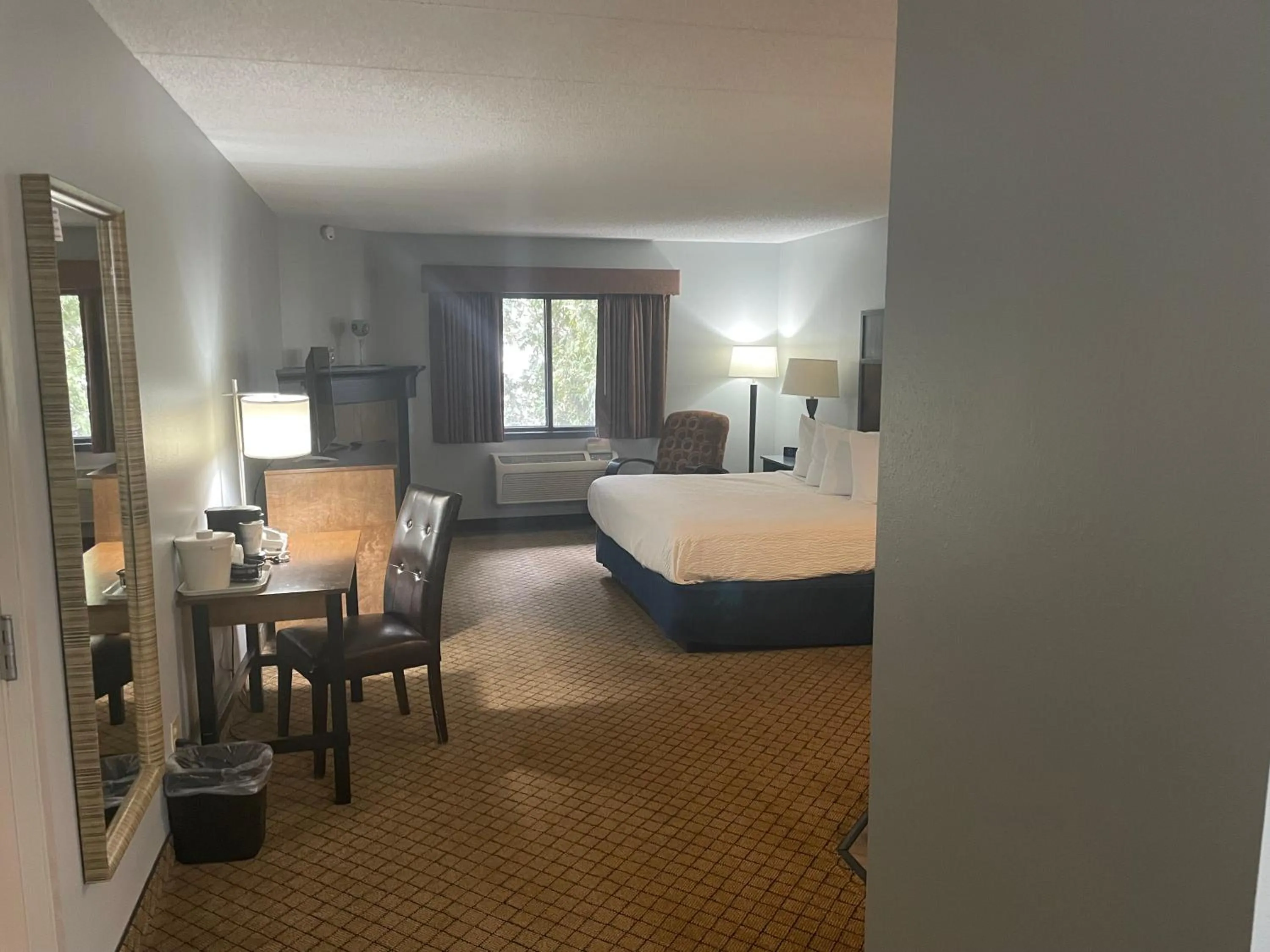TV and multimedia, Bed in AmericInn by Wyndham Hartford WI