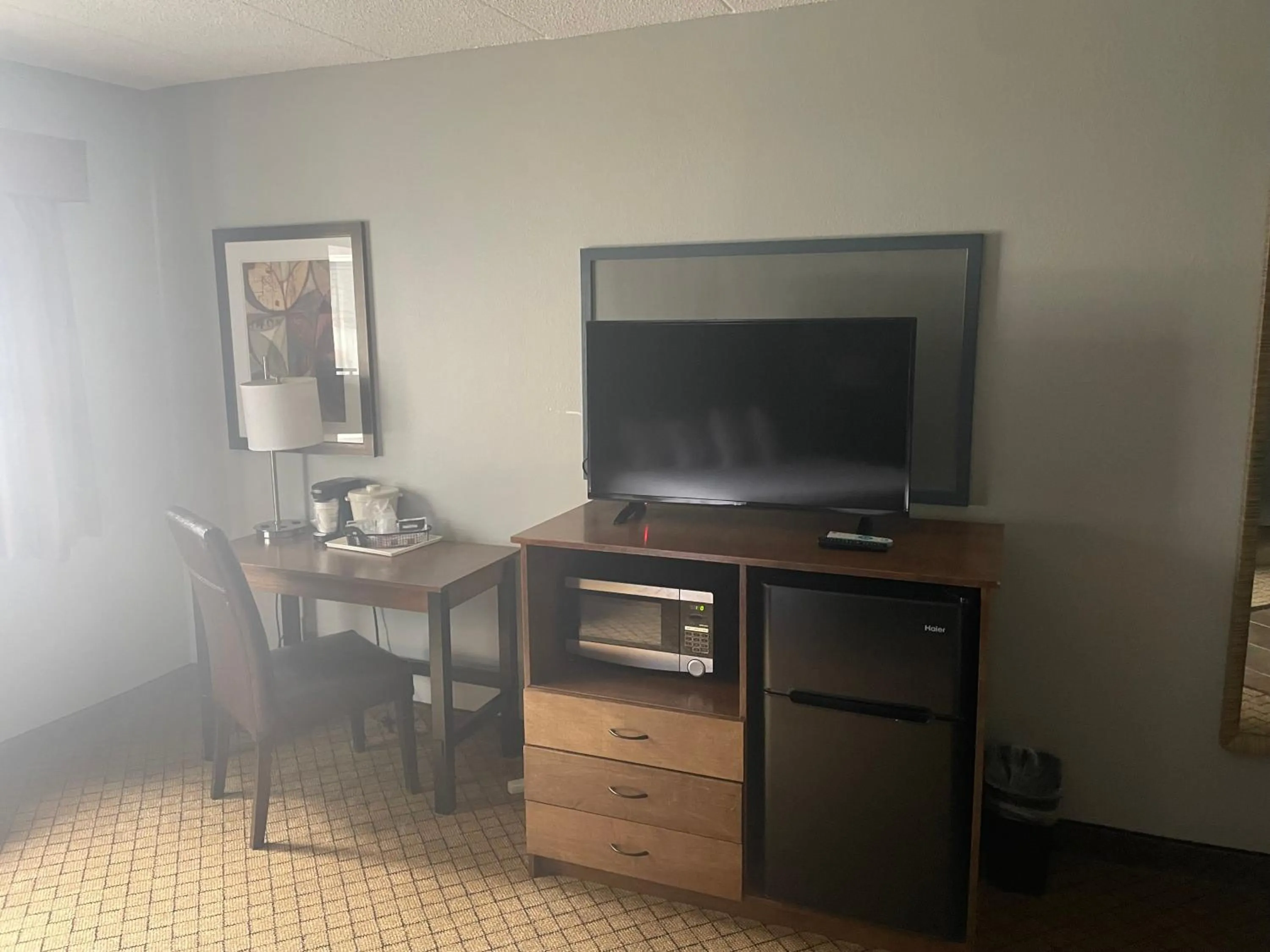TV and multimedia in AmericInn by Wyndham Hartford WI