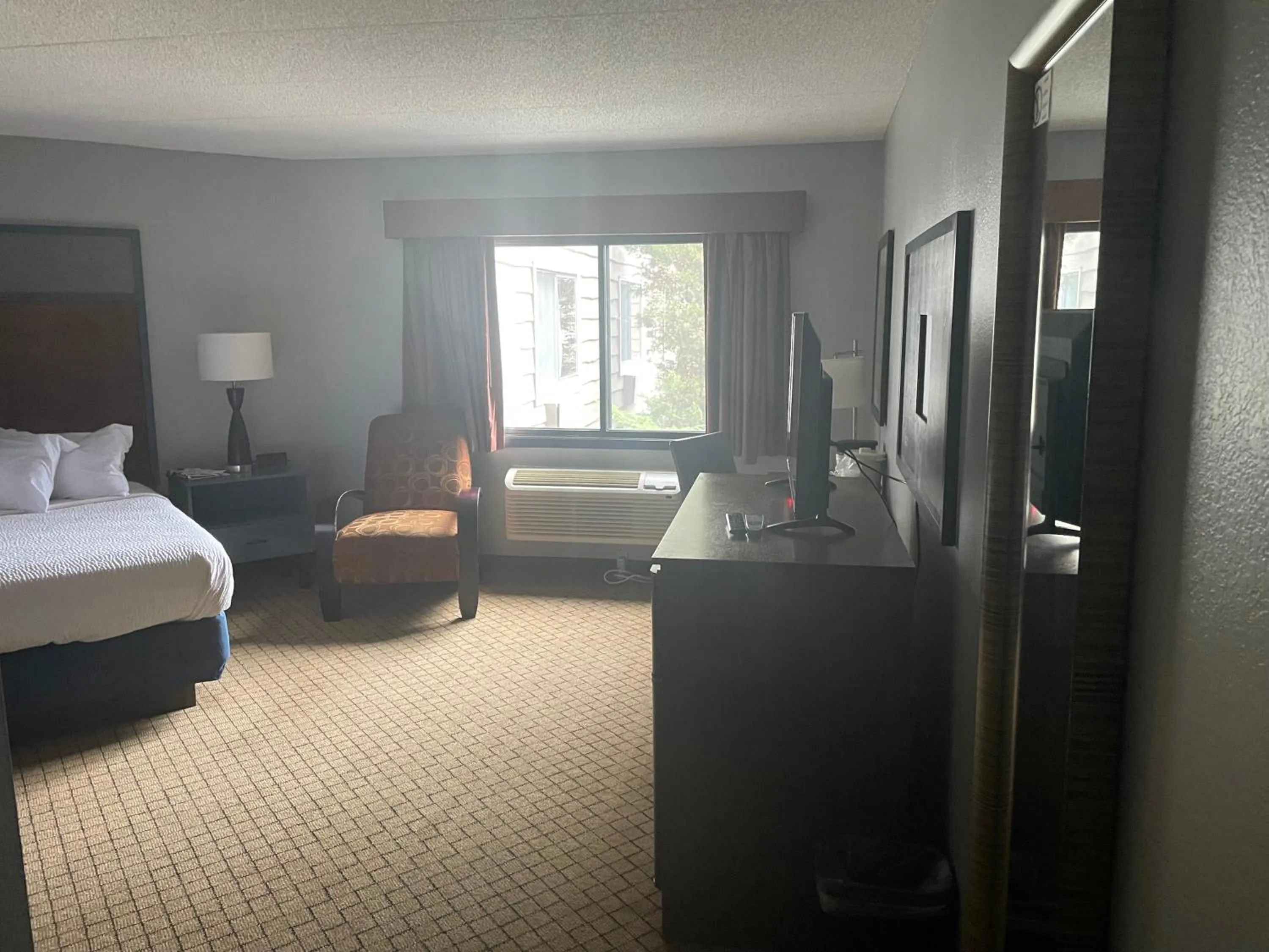 TV and multimedia, Bed in AmericInn by Wyndham Hartford WI