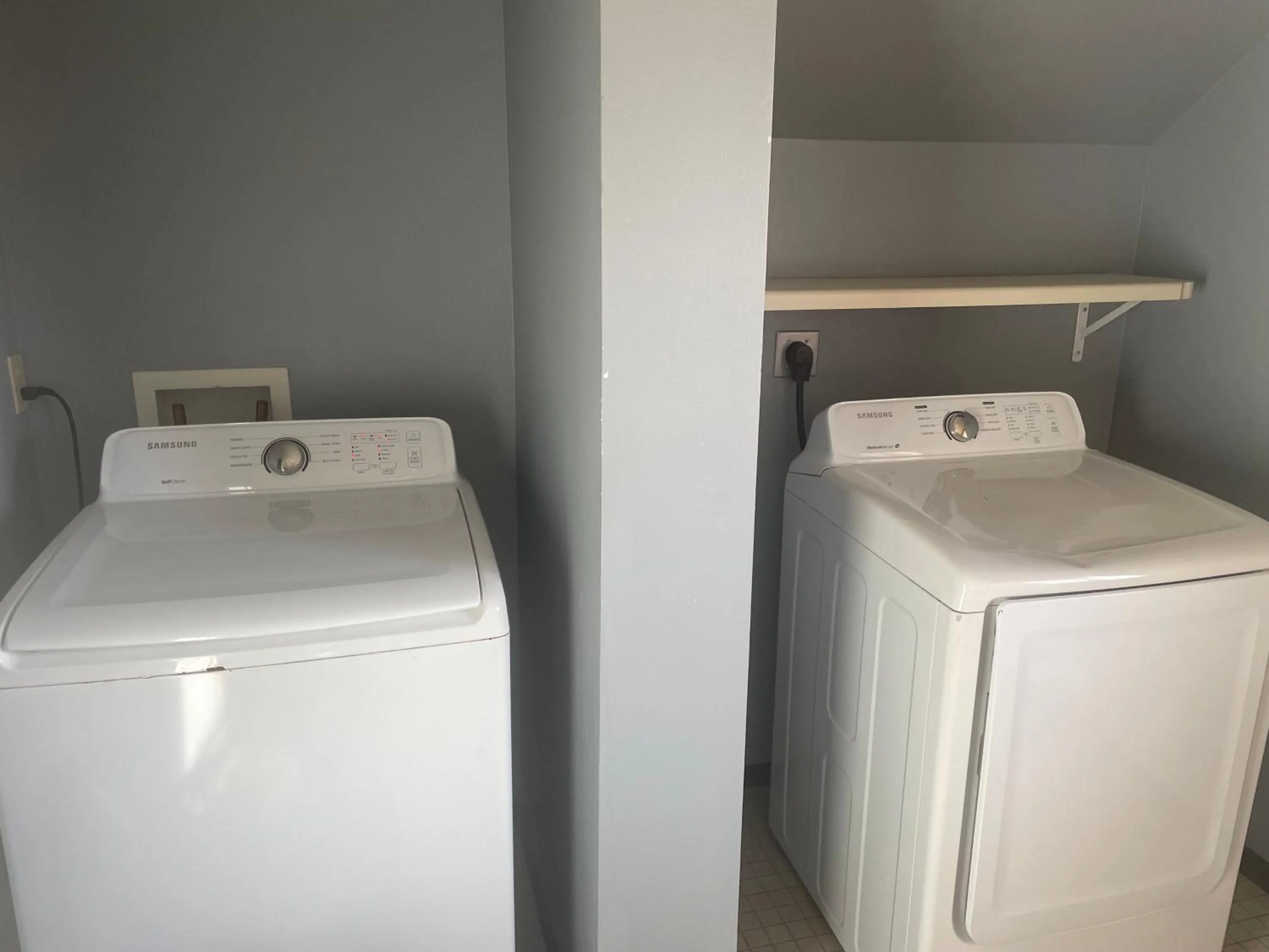 laundry in AmericInn by Wyndham Hartford WI