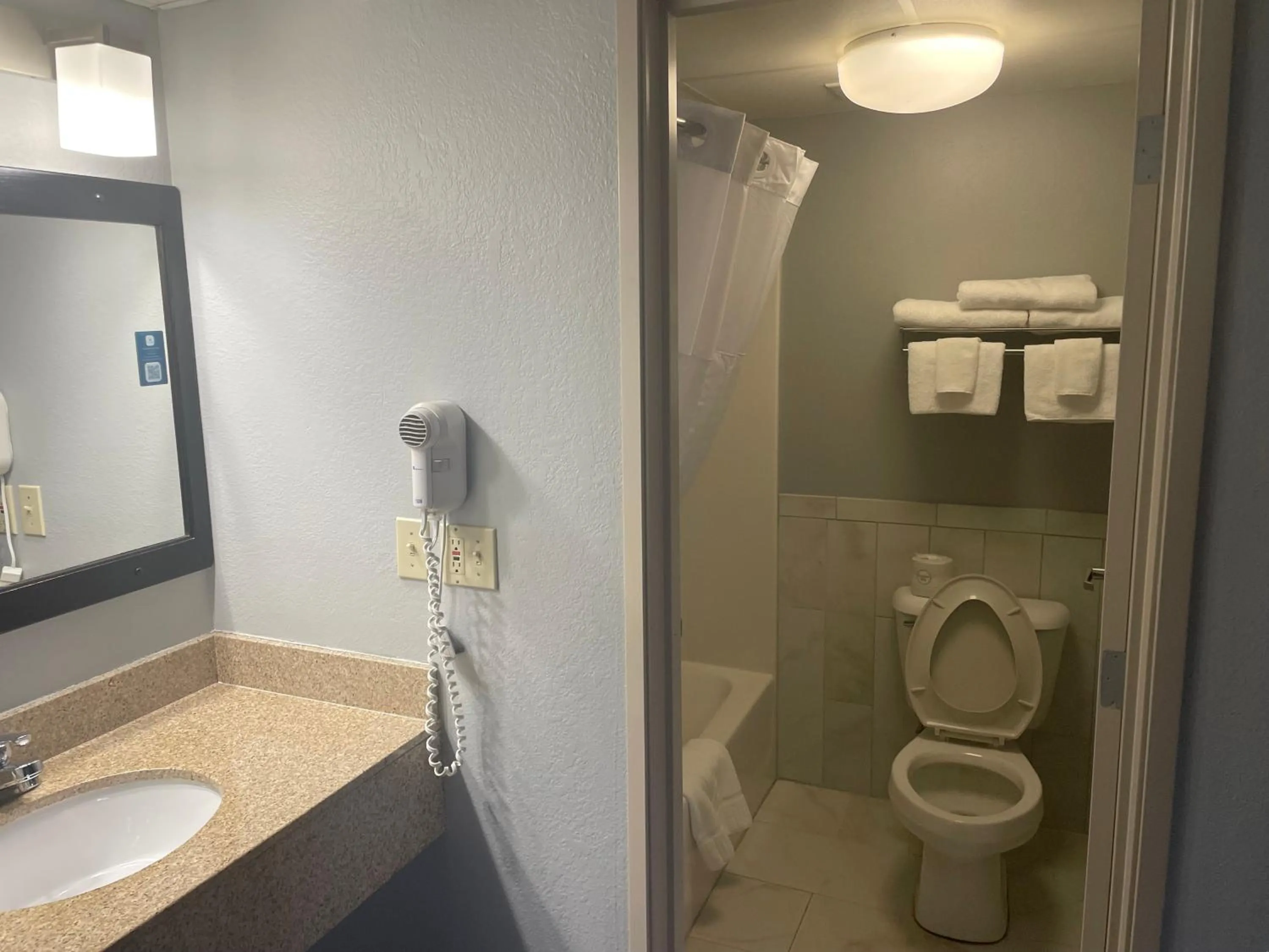 Bathroom in AmericInn by Wyndham Hartford WI