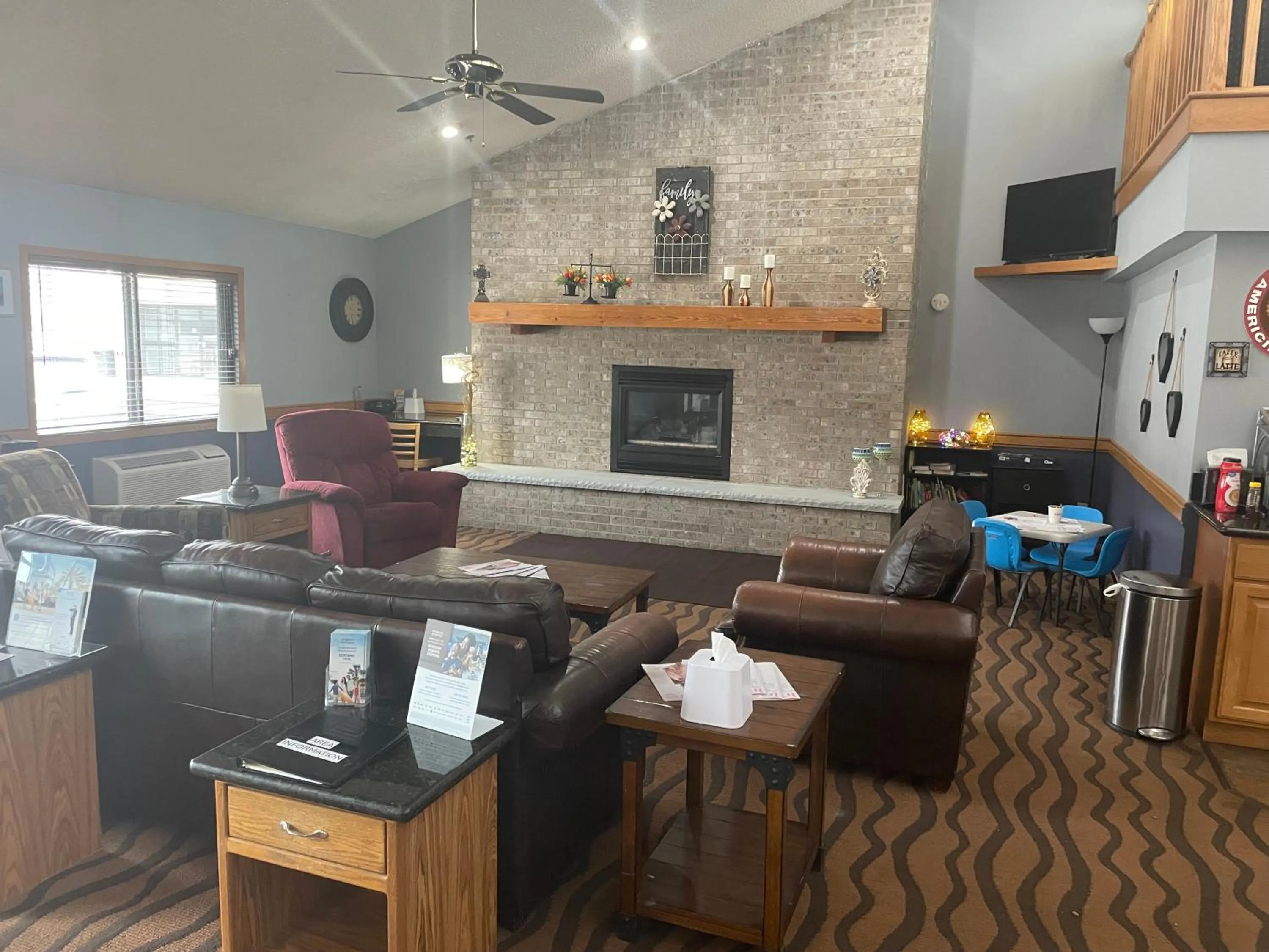 Lobby or reception in AmericInn by Wyndham Hartford WI