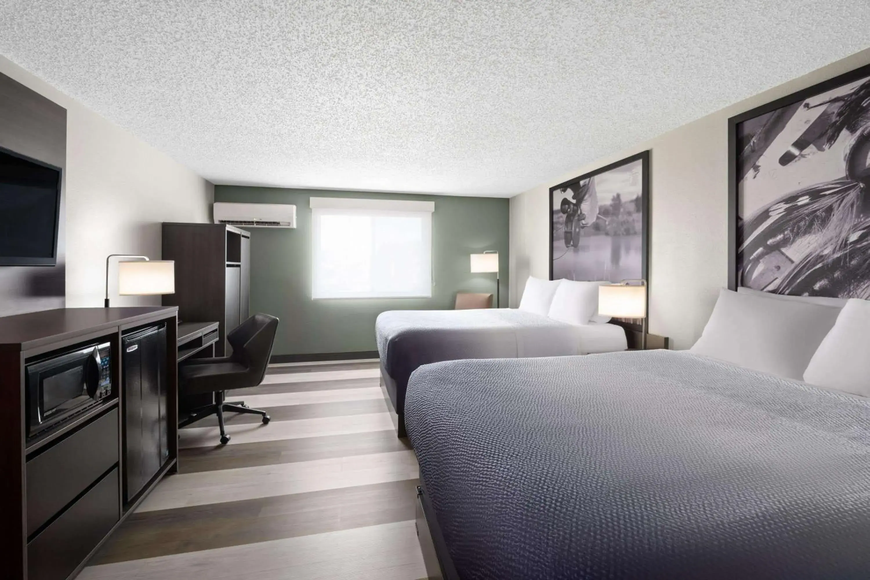 Deluxe Queen Room with Two Queen Beds - Non-Smoking in Super 8 by Wyndham Conrad Deluxe Queen Room with Two Queen Beds - Non-Smoking in Super 8 by Wyndham Conrad