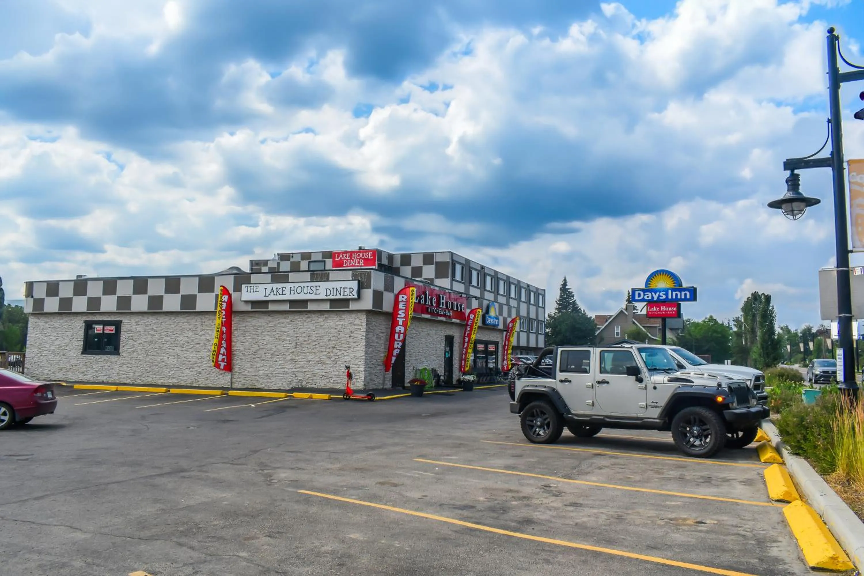 Property building in Days Inn by Wyndham Sylvan Lake