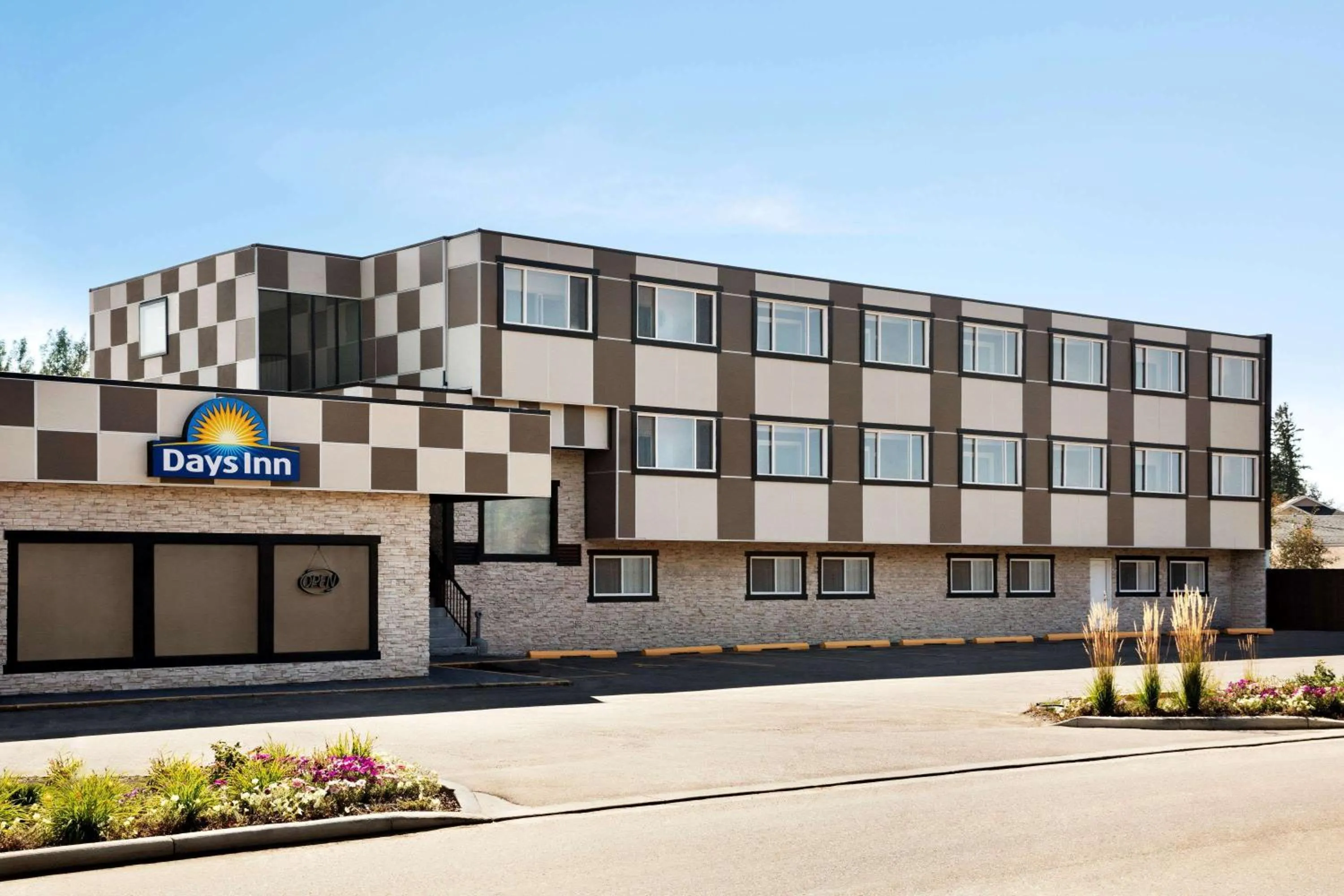 Property building in Days Inn by Wyndham Sylvan Lake