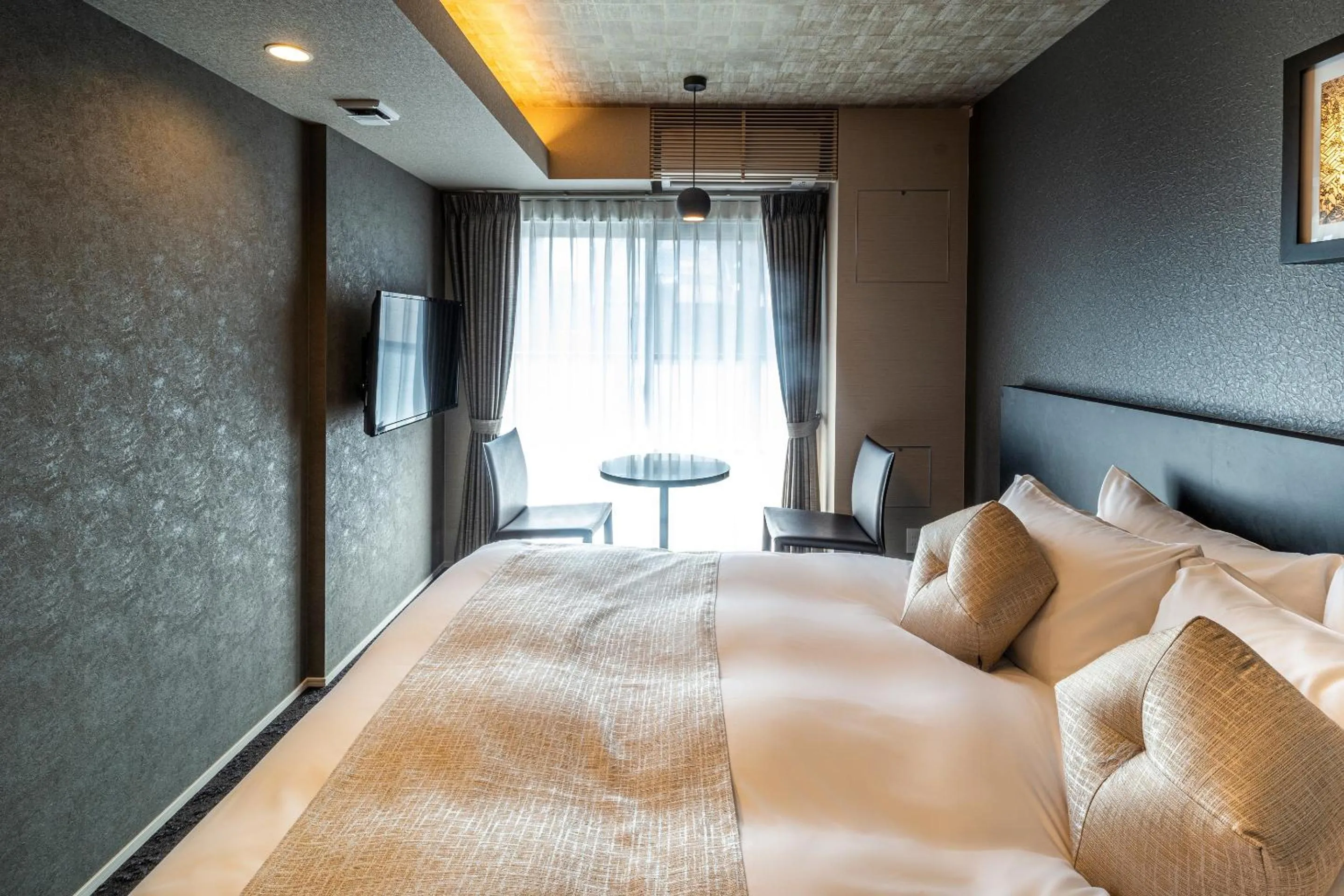 Bed in RESI STAY Mayu Grace Hotel