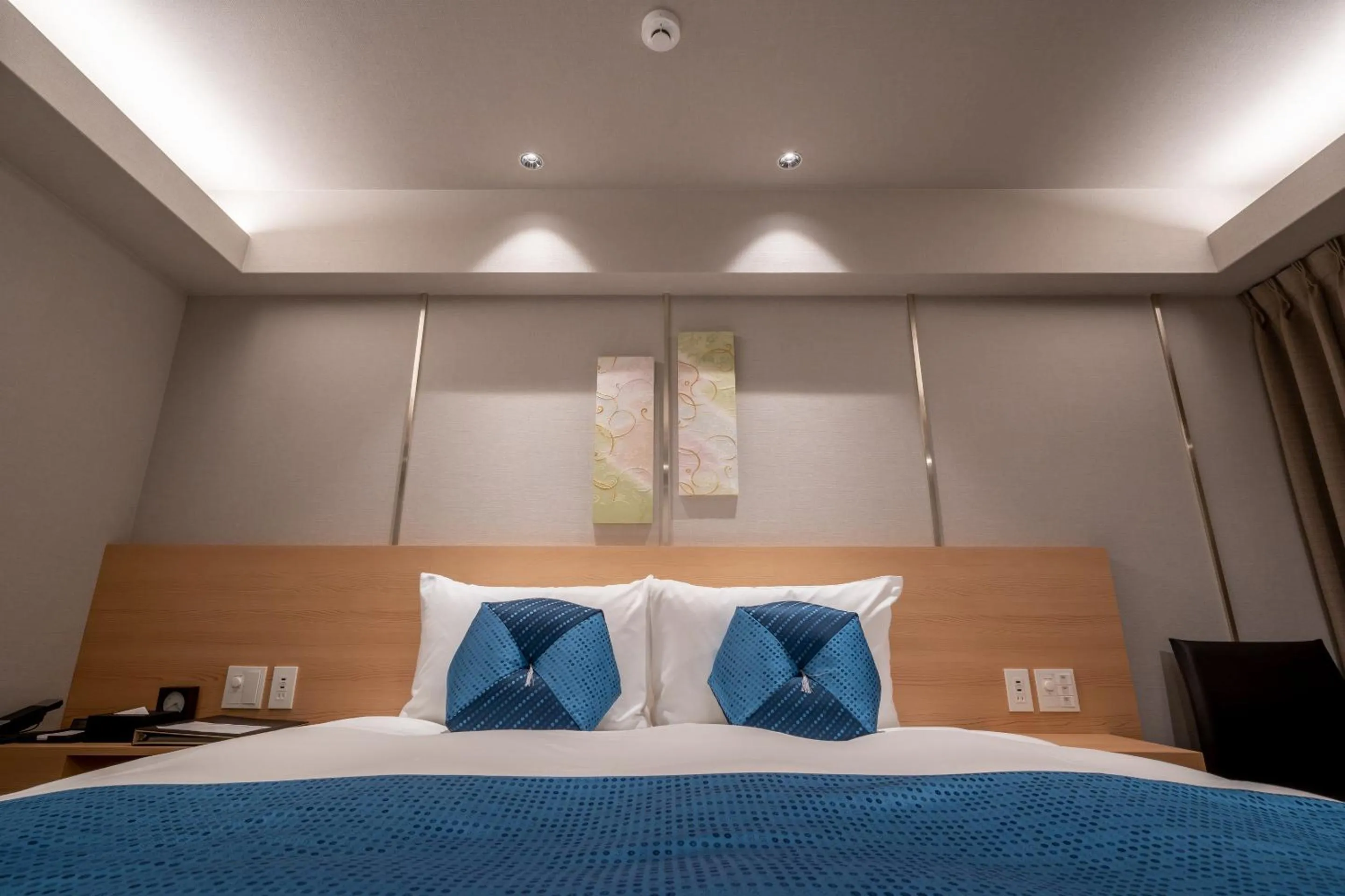 Bed in RESI STAY Mayu Grace Hotel