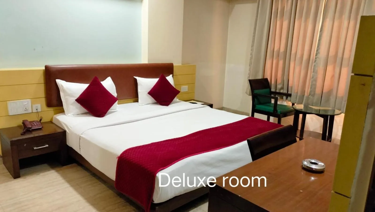 Photo of the whole room, Bed in HOTEL NANGIS PRIDE