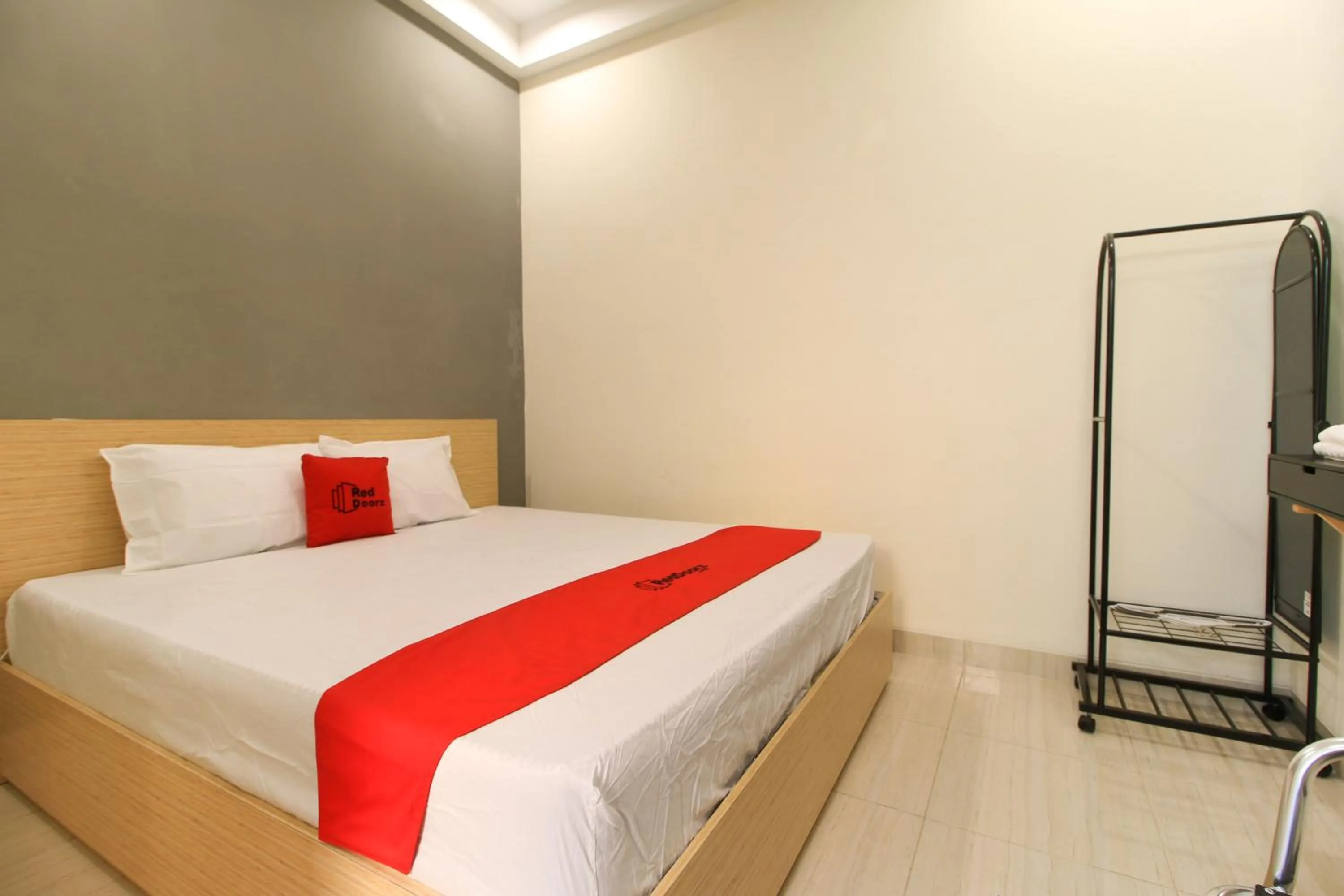 Bed in RedDoorz at Hotel Putra Perdana Klaten