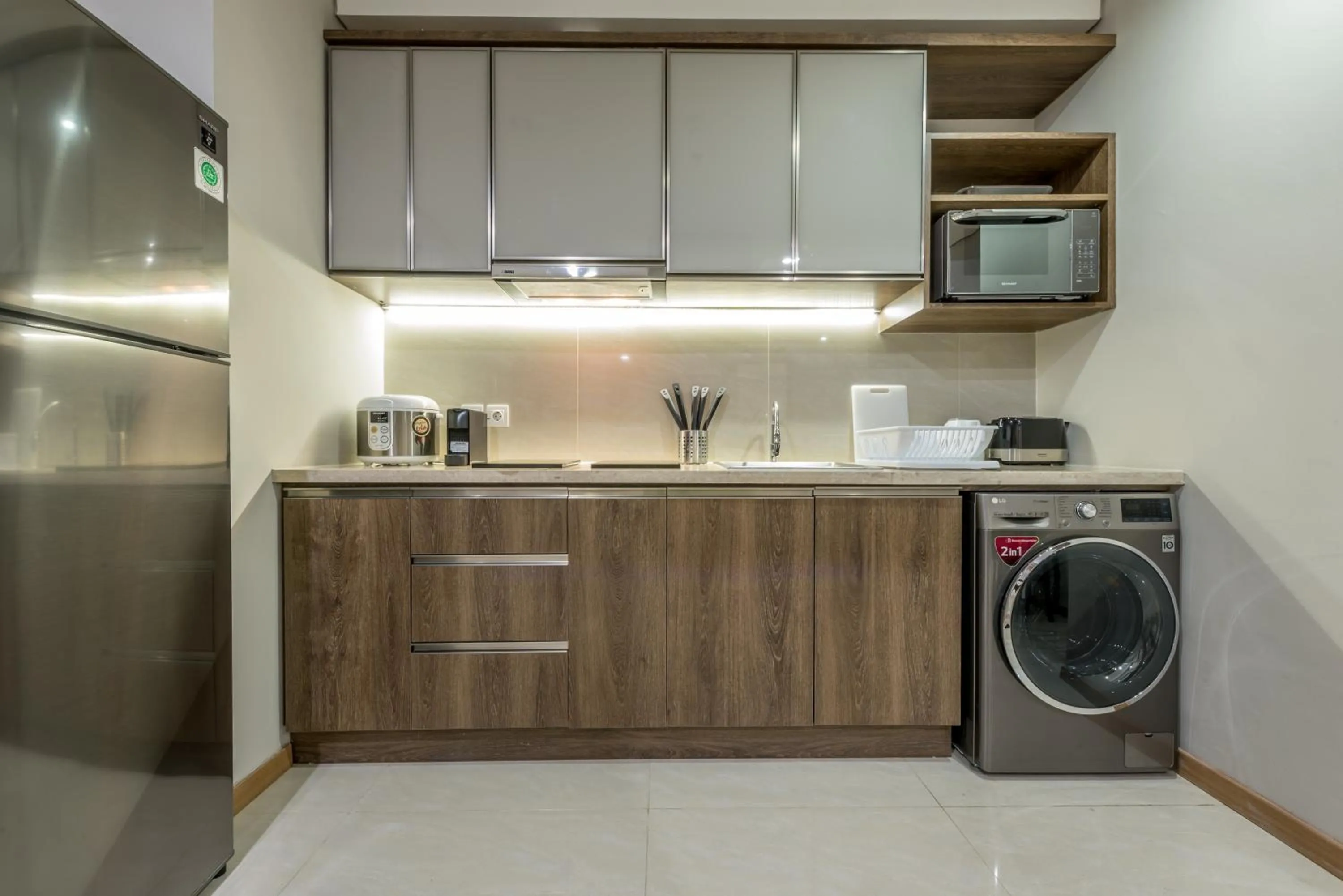 Kitchen or kitchenette in Grande Valore Hotel Cikarang