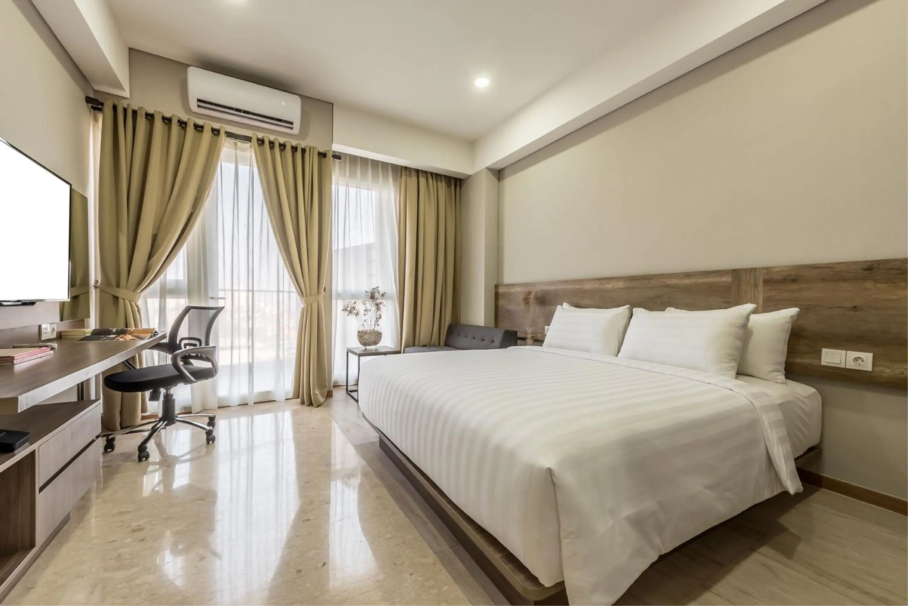 Bed in Grande Valore Hotel Cikarang