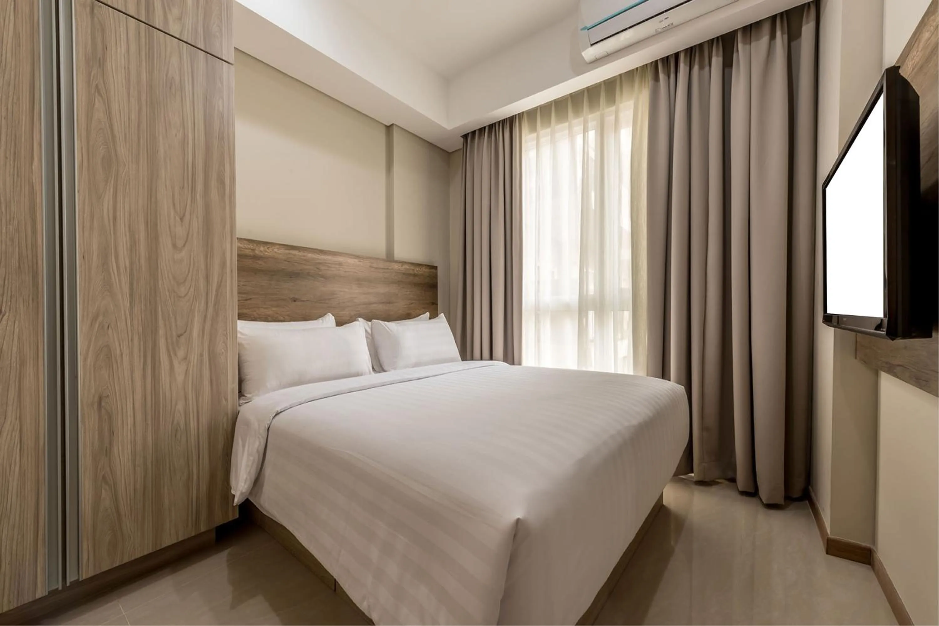 Bed in Grande Valore Hotel Cikarang