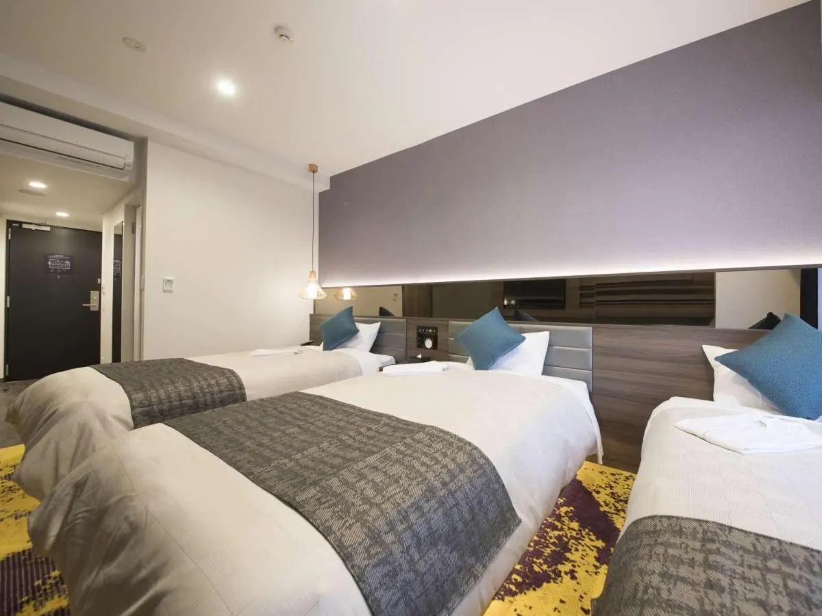 Bed in Quintessa Hotel Fukuoka Tenjin Minami