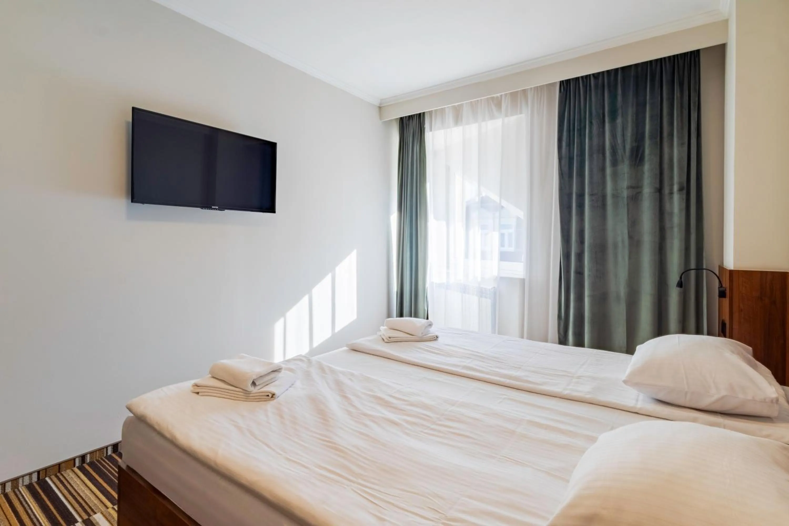 Bed in Noclegi Hit Rooms & Apartments