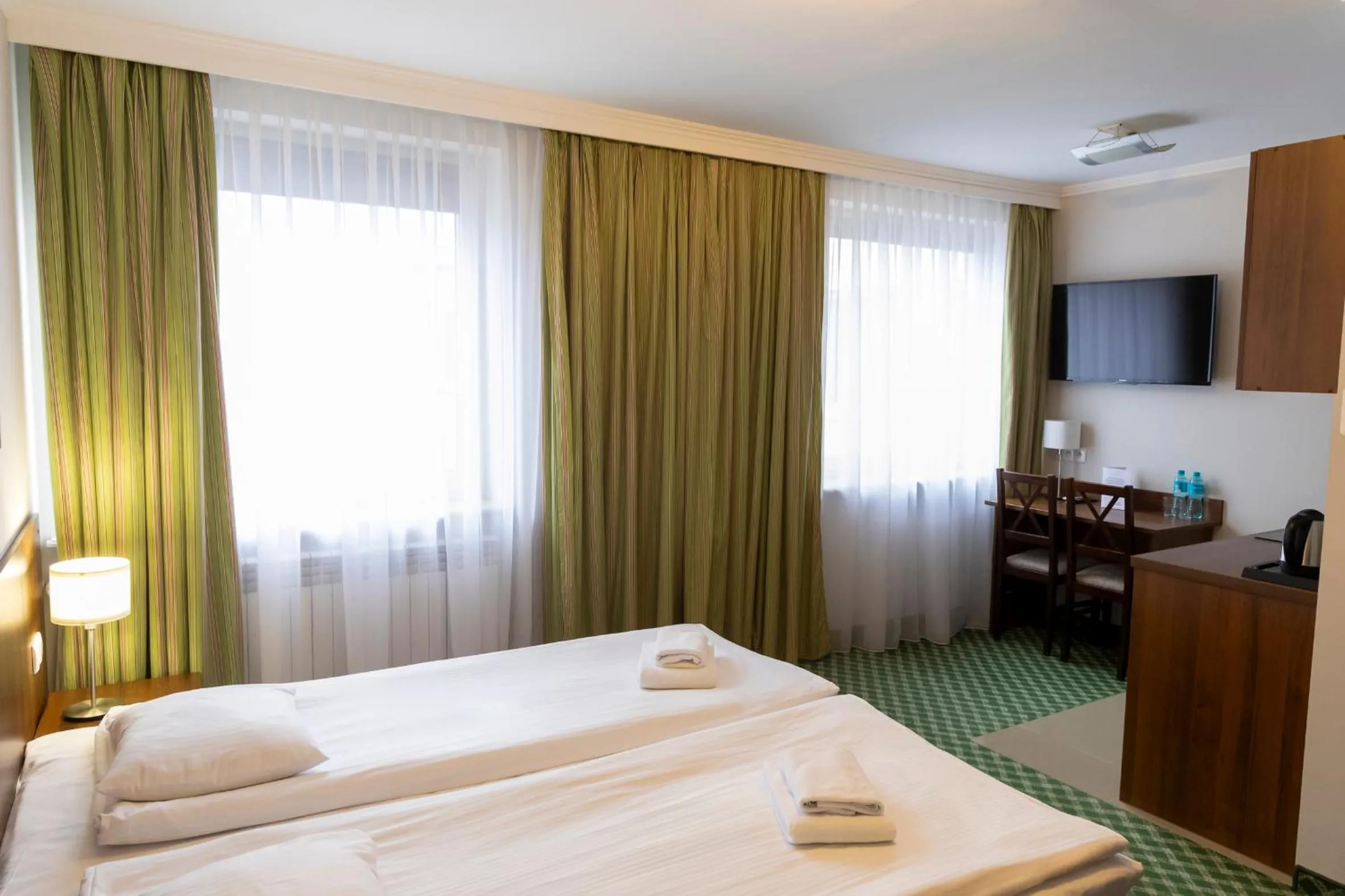 Bed in Noclegi Hit Rooms & Apartments