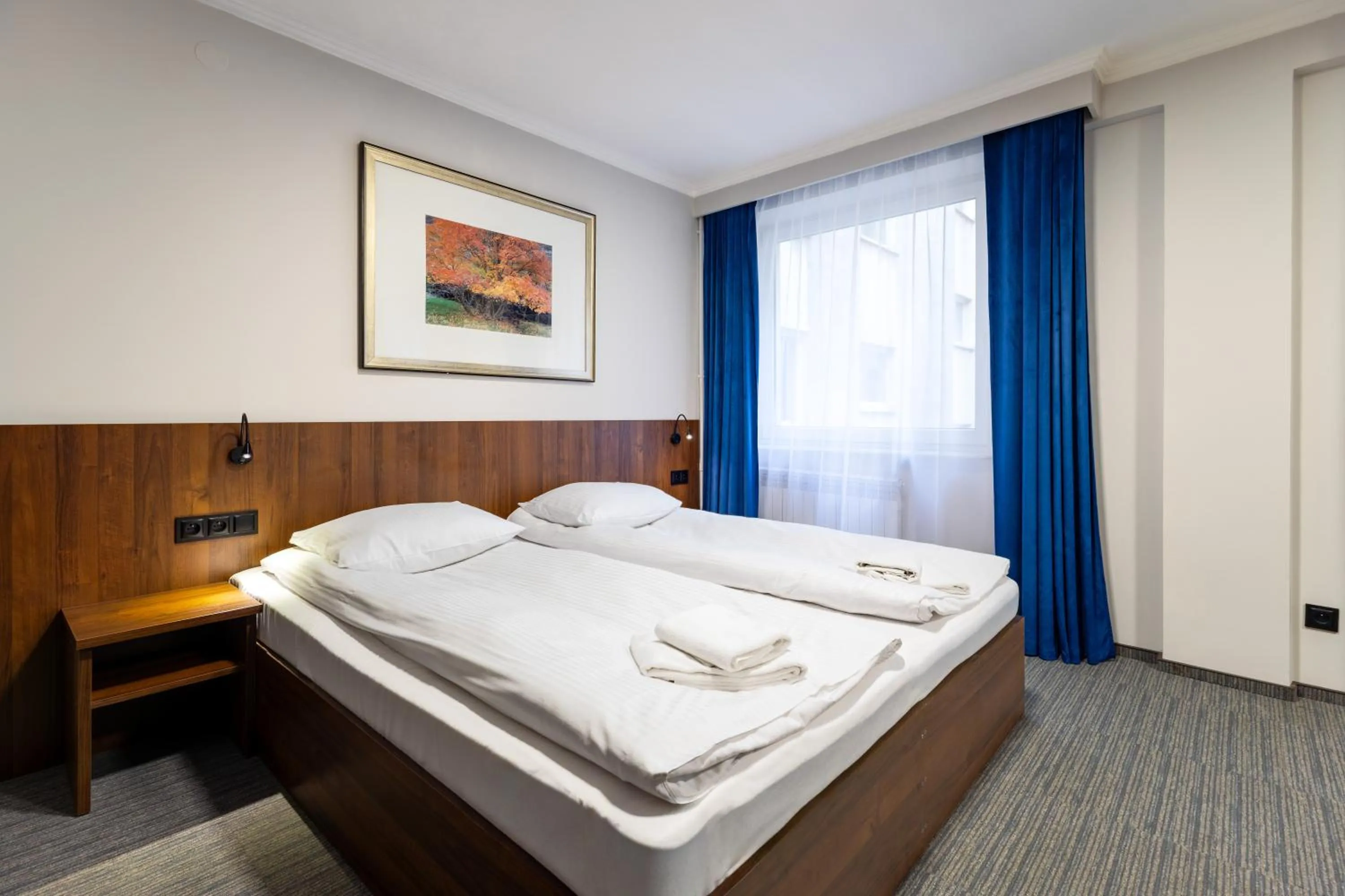 Bed in Noclegi Hit Rooms & Apartments