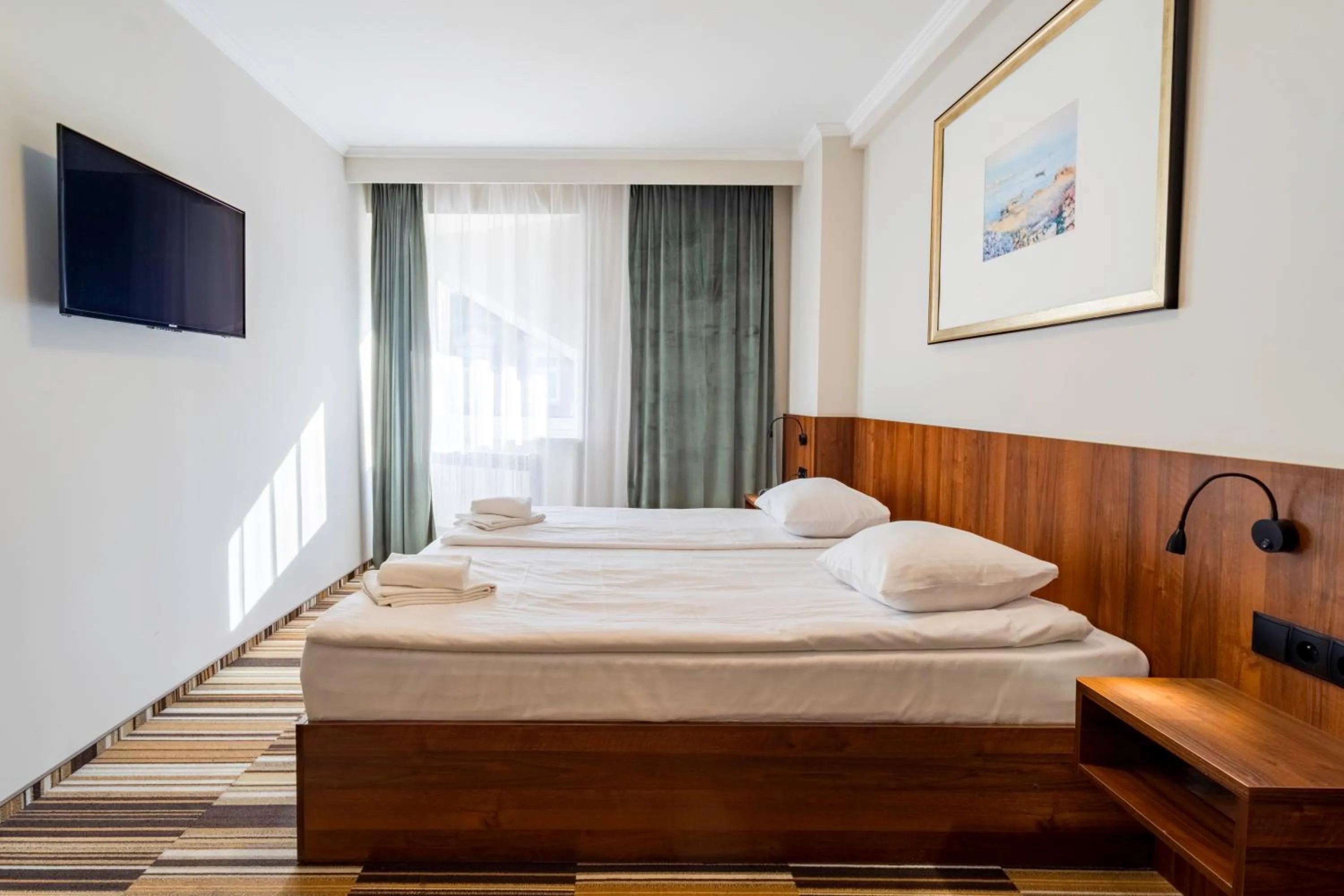 Bed in Noclegi Hit Rooms & Apartments