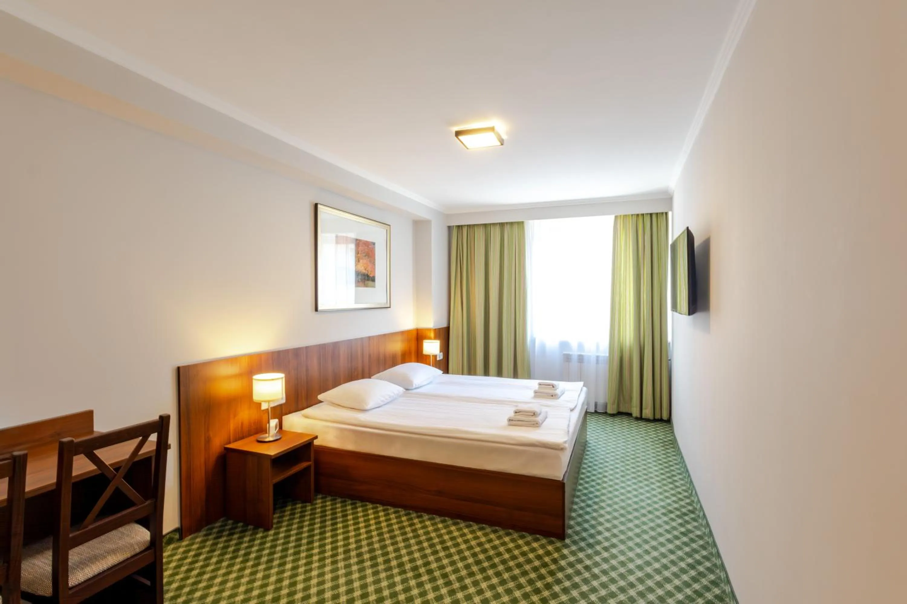 Bed in Noclegi Hit Rooms & Apartments