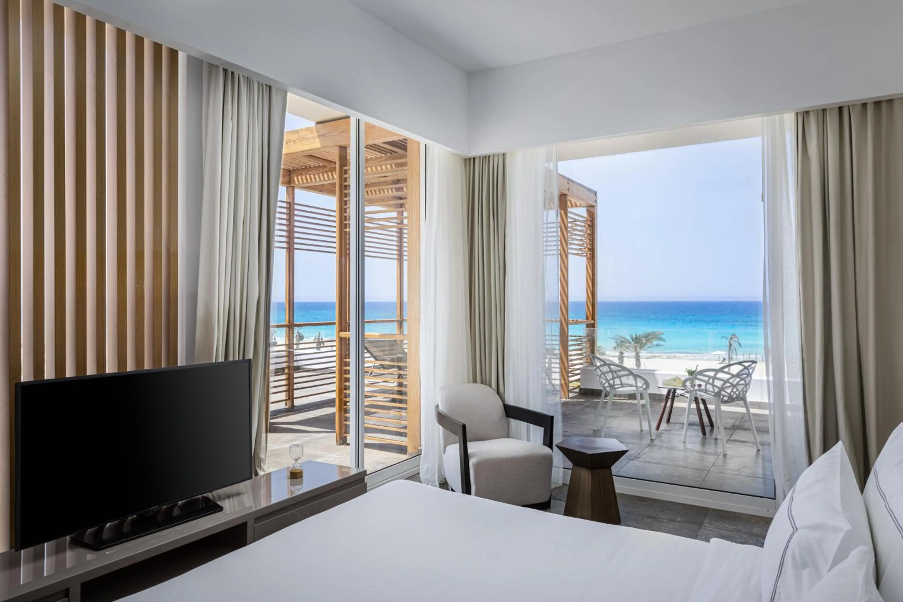 Bed in The G Hotel Seashell