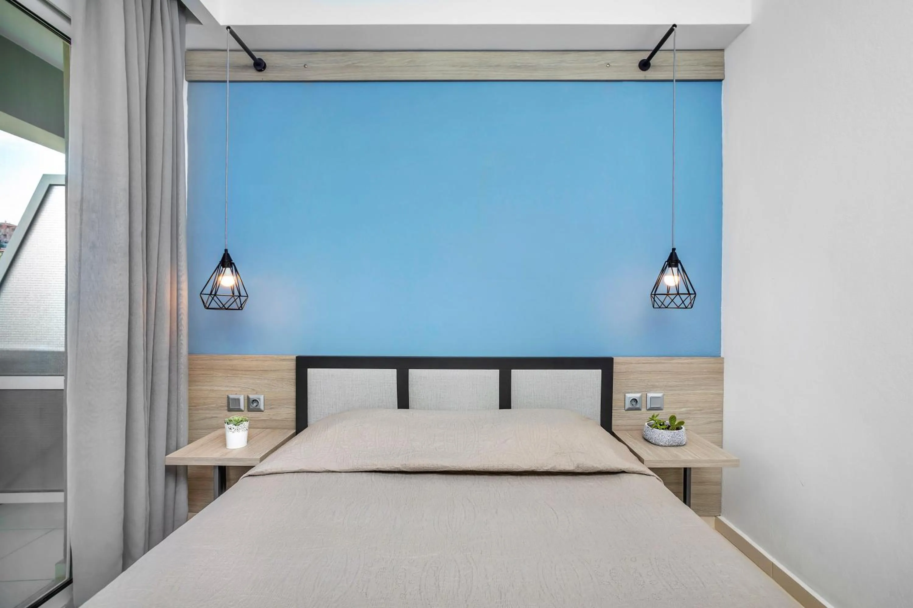 Bed in Agreste Luxury Apartments