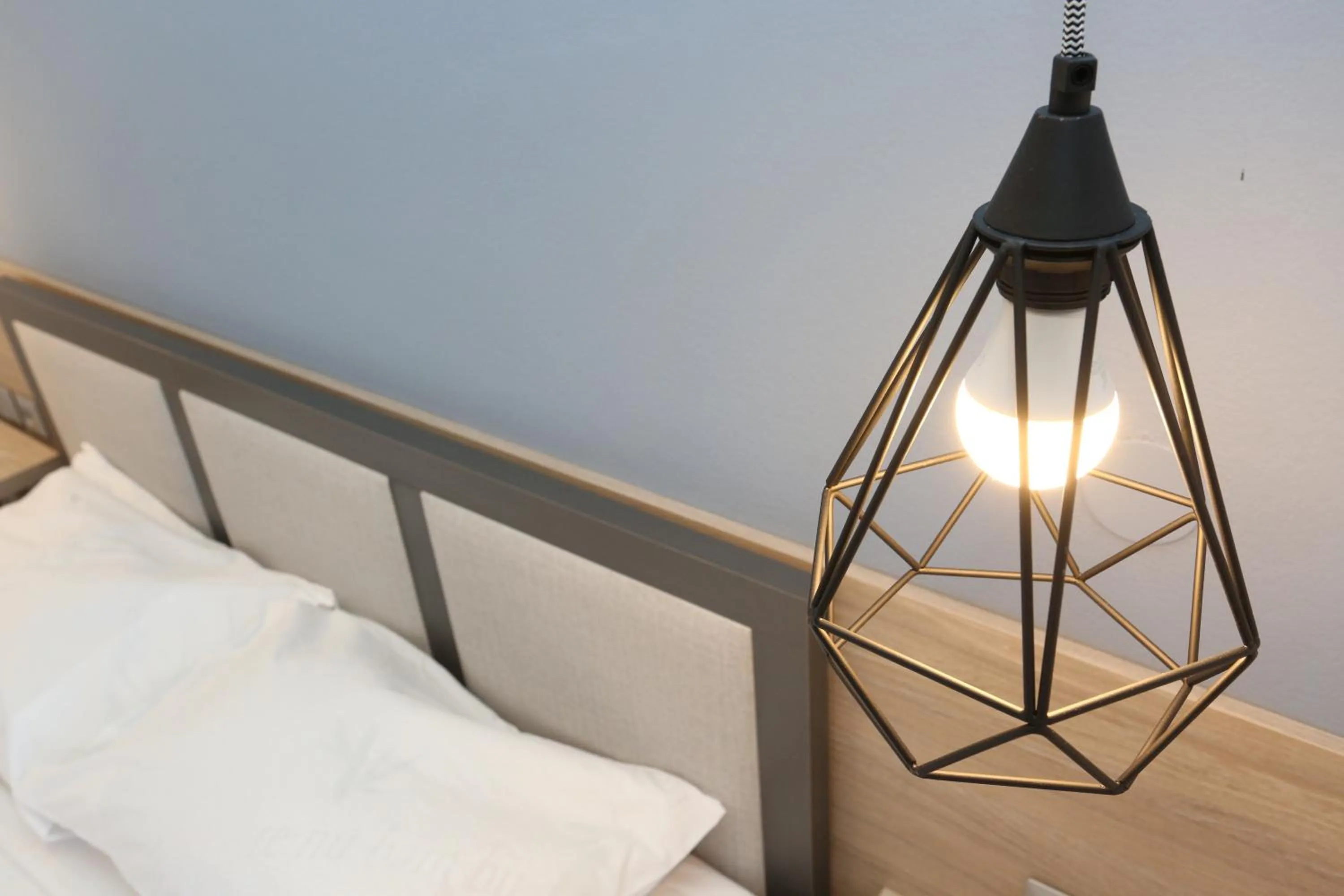 Decorative detail, Bed in Agreste Luxury Apartments