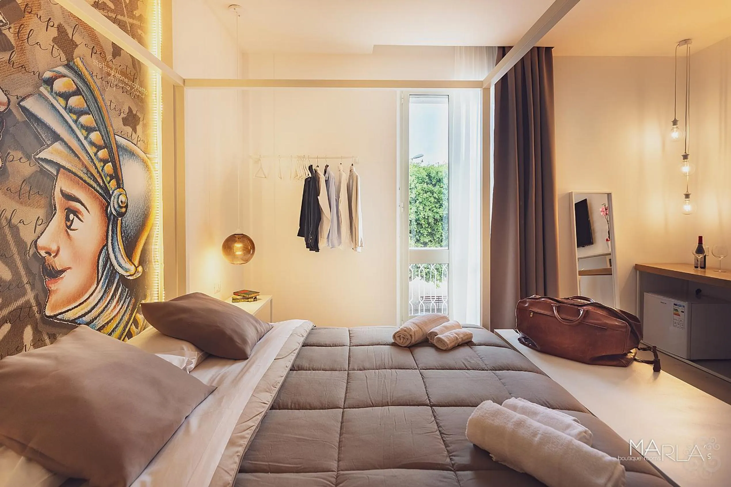 Bed in Marla's boutique rooms