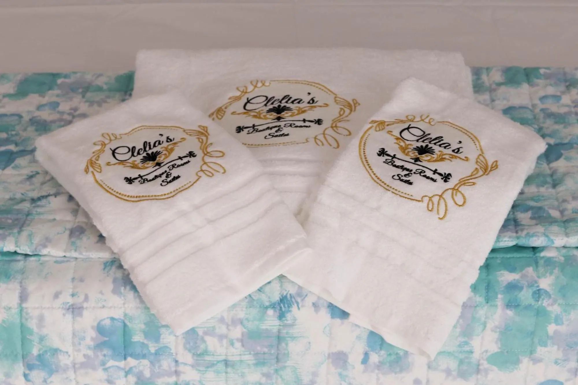 Property logo or sign in Clelia's Boutique Rooms & Suites