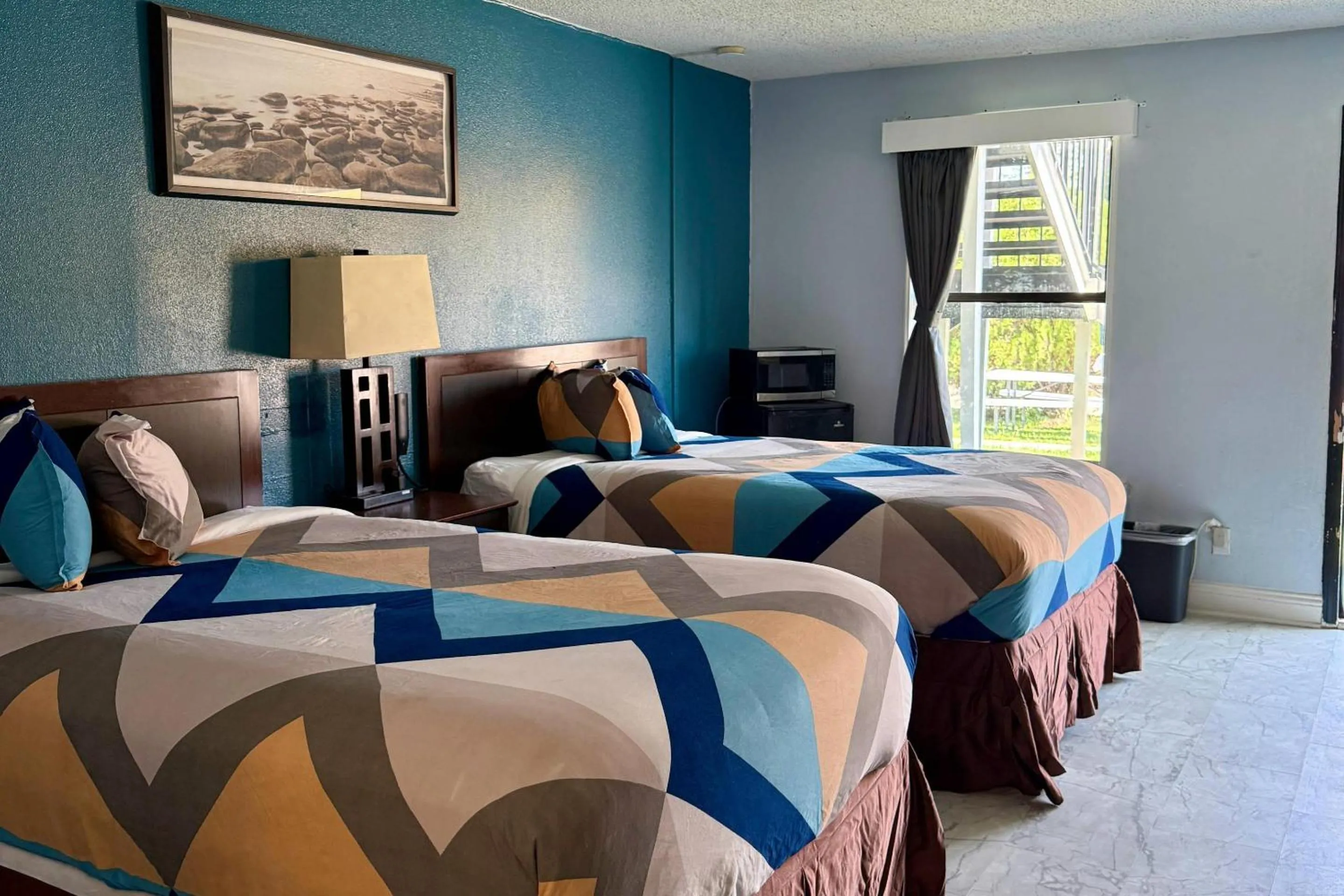 Bedroom, Bed in Rodeway Inn Hattiesburg North