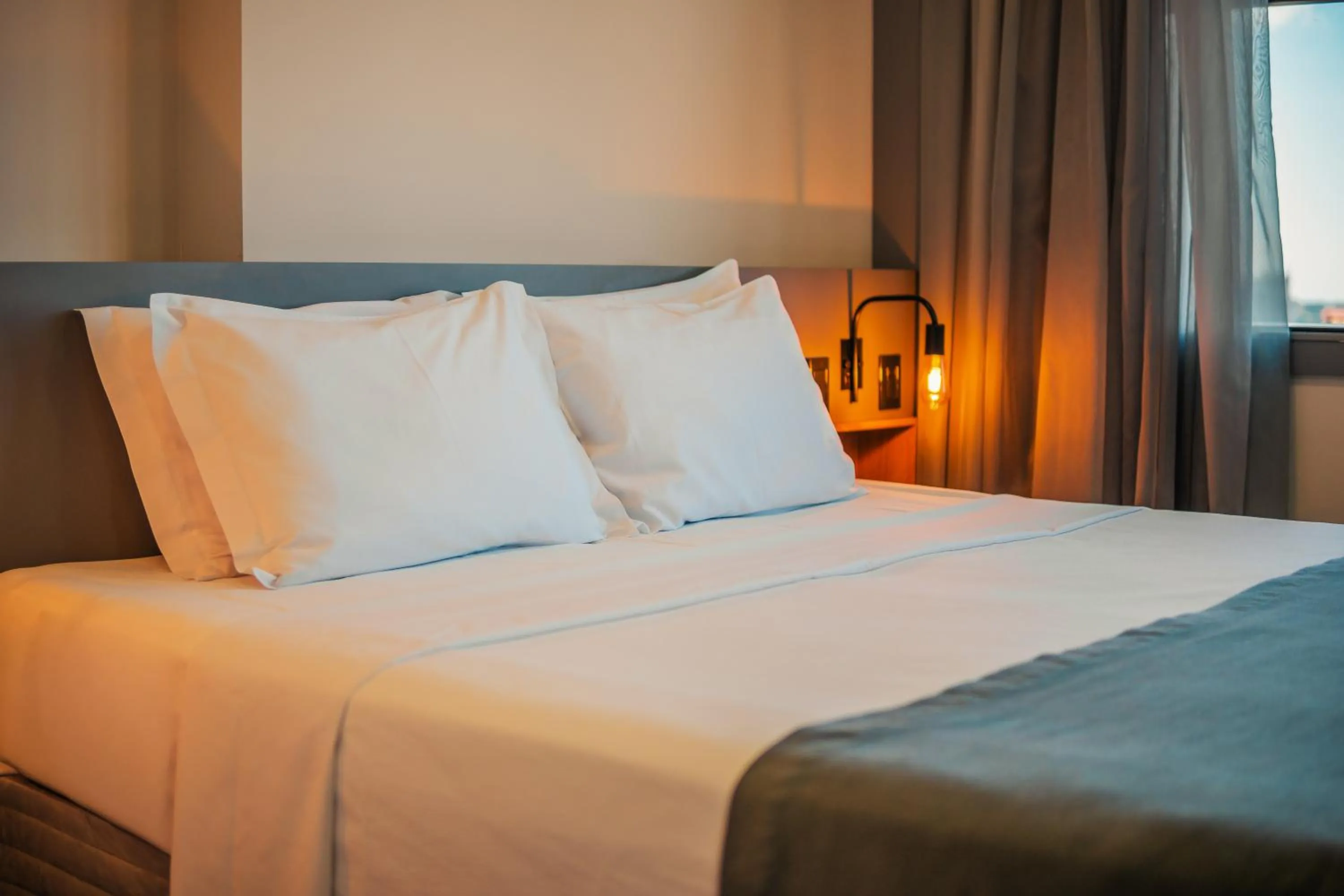 Bed in Hotel Laghetto Estação