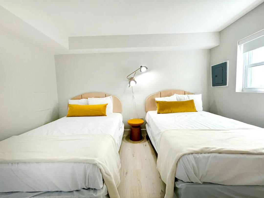 Bed in Coliseum Ocean Resort