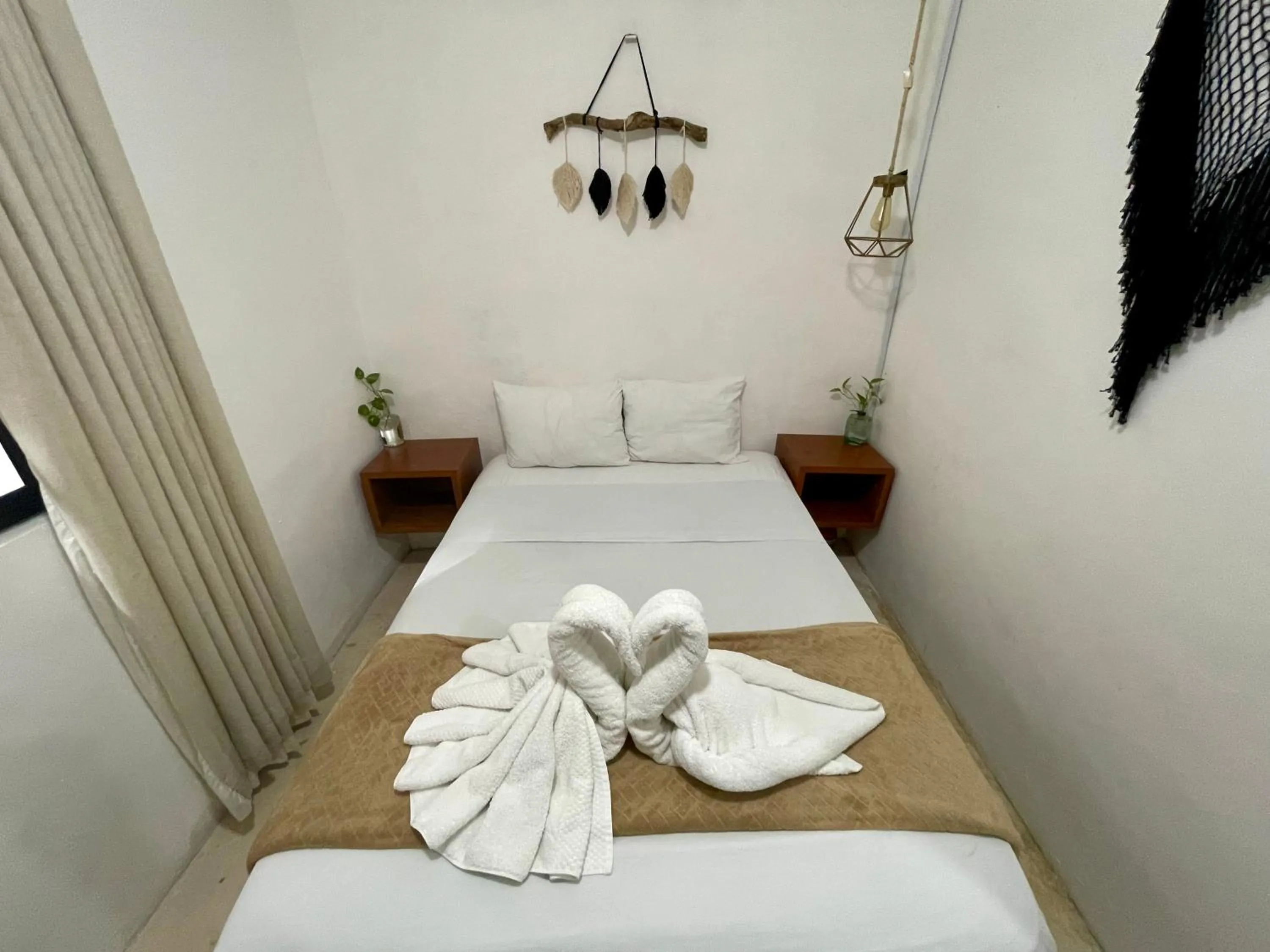 Bed in Hotel AKBAL Holbox