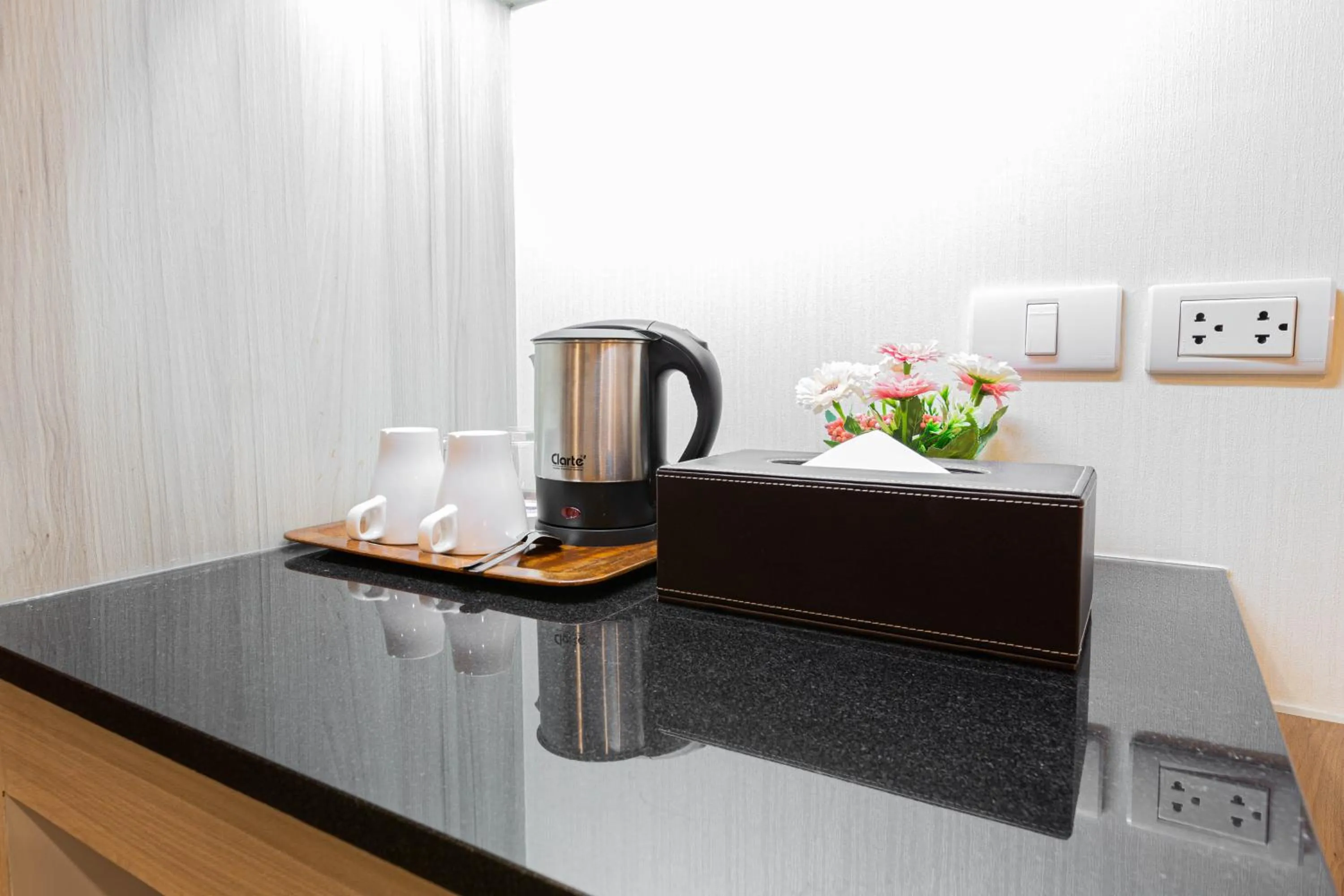 Coffee/tea facilities in Leela Orchid Hotel