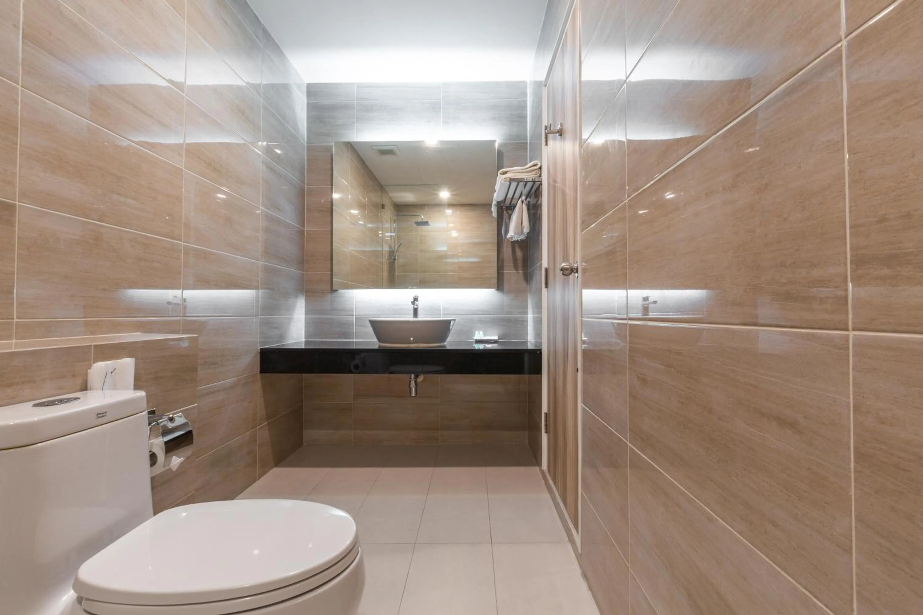 Bathroom in Leela Orchid Hotel