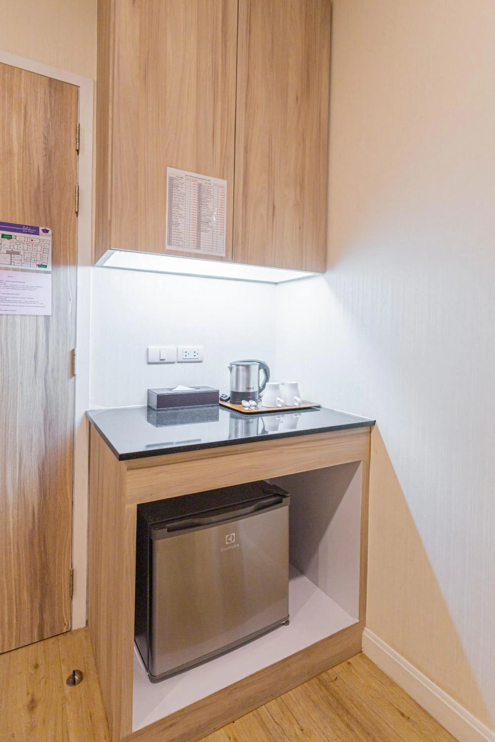 minibar in Leela Orchid Hotel