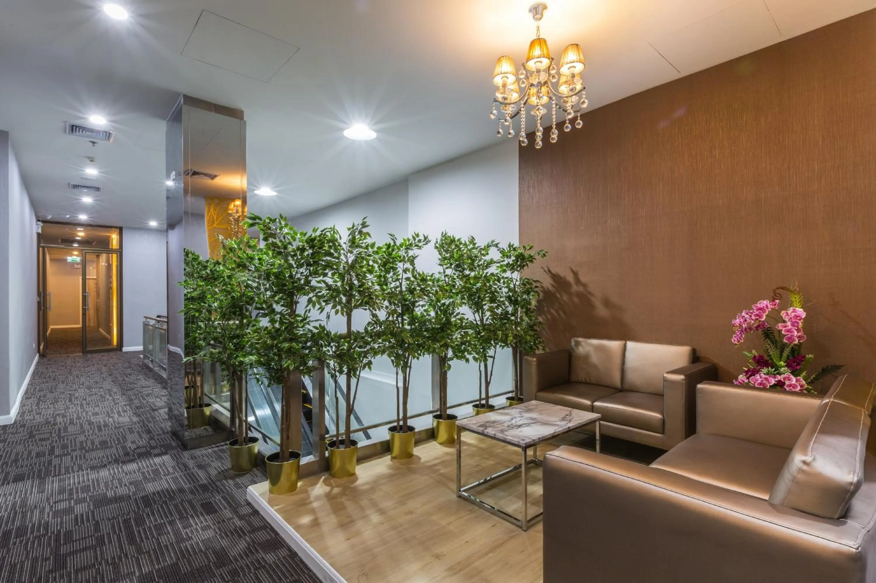 Seating area in Leela Orchid Hotel