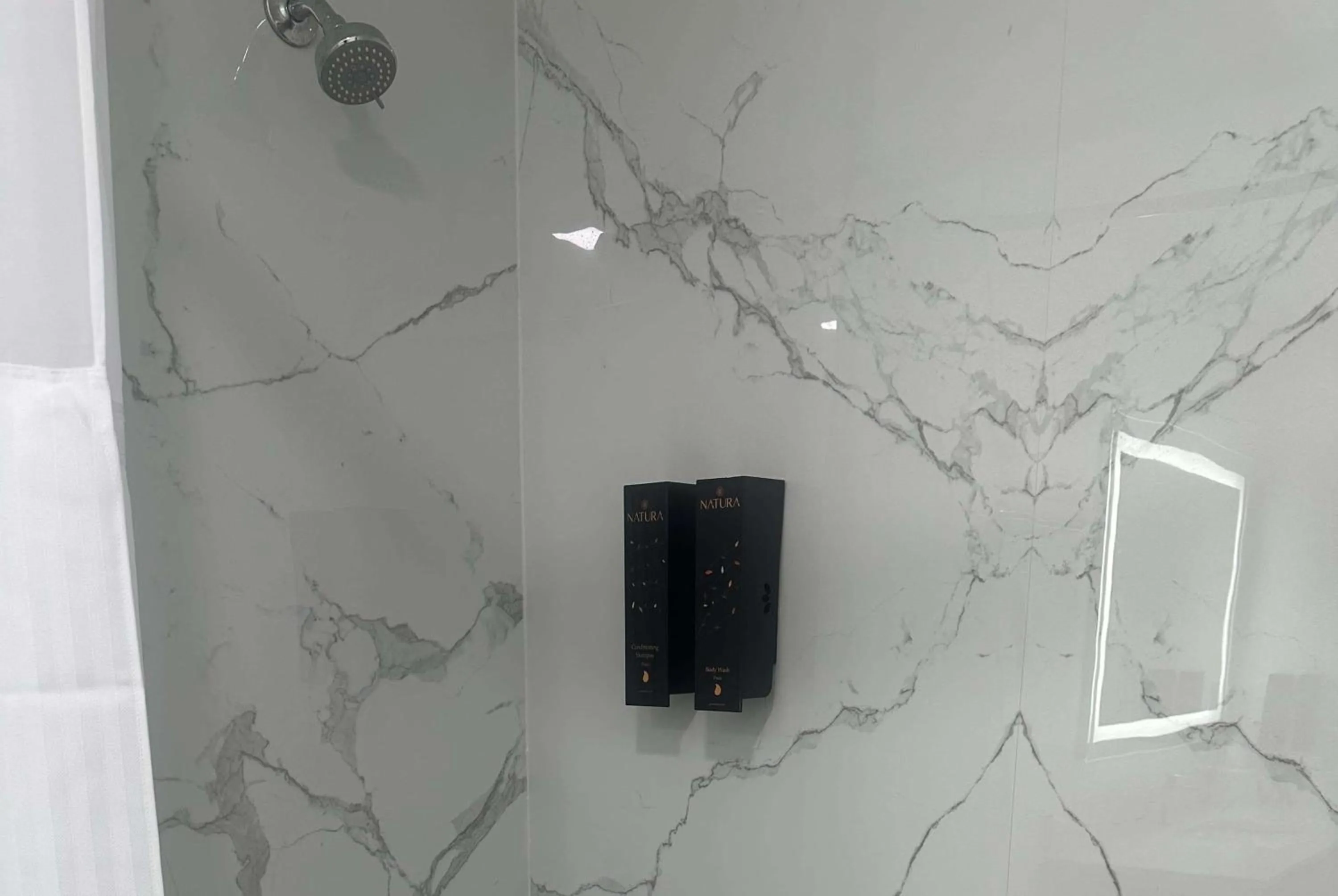 Bathroom in Super 8 by Wyndham Oceanside Downtown