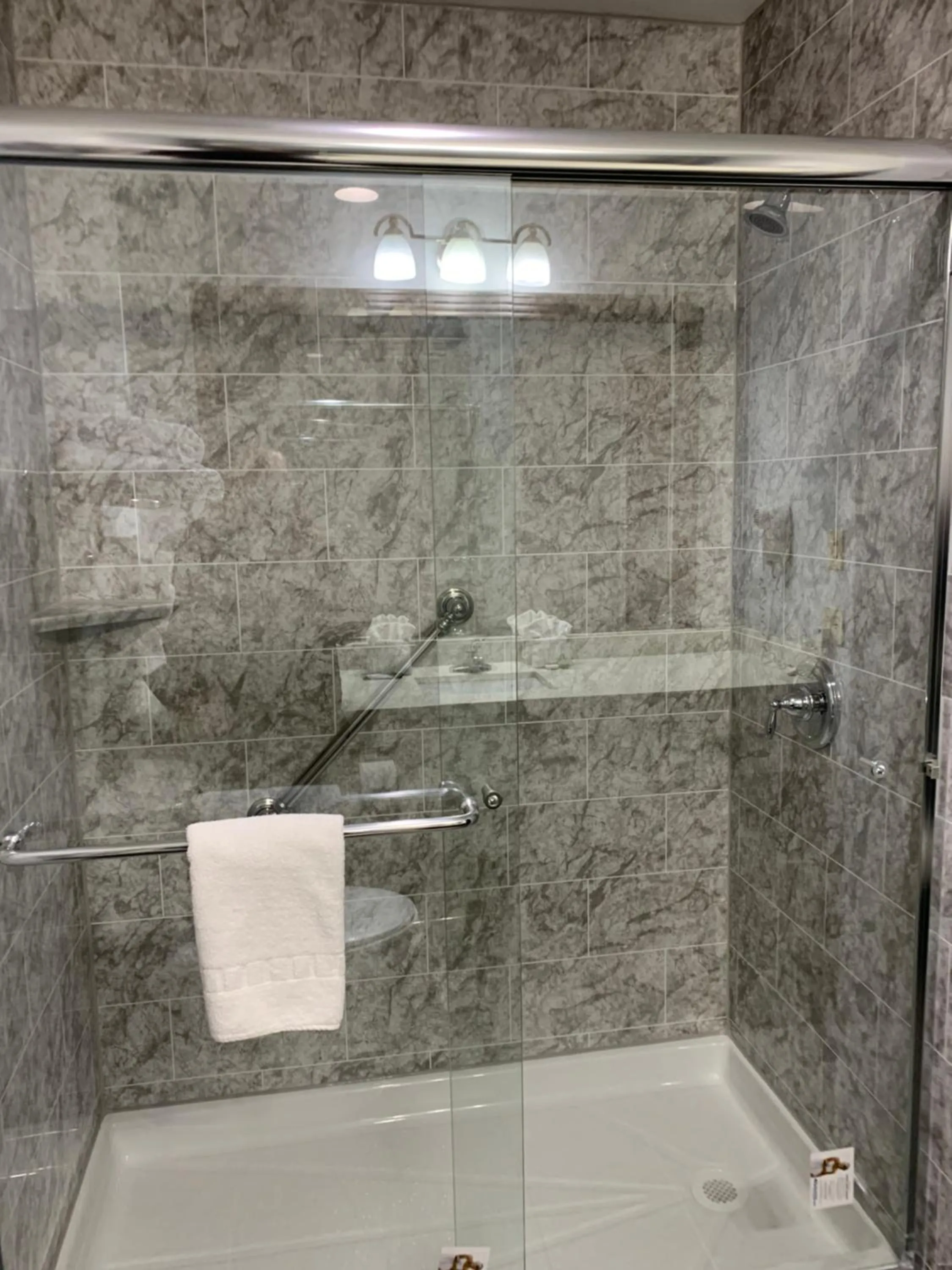 Shower in Blue Bay Inn and Suites