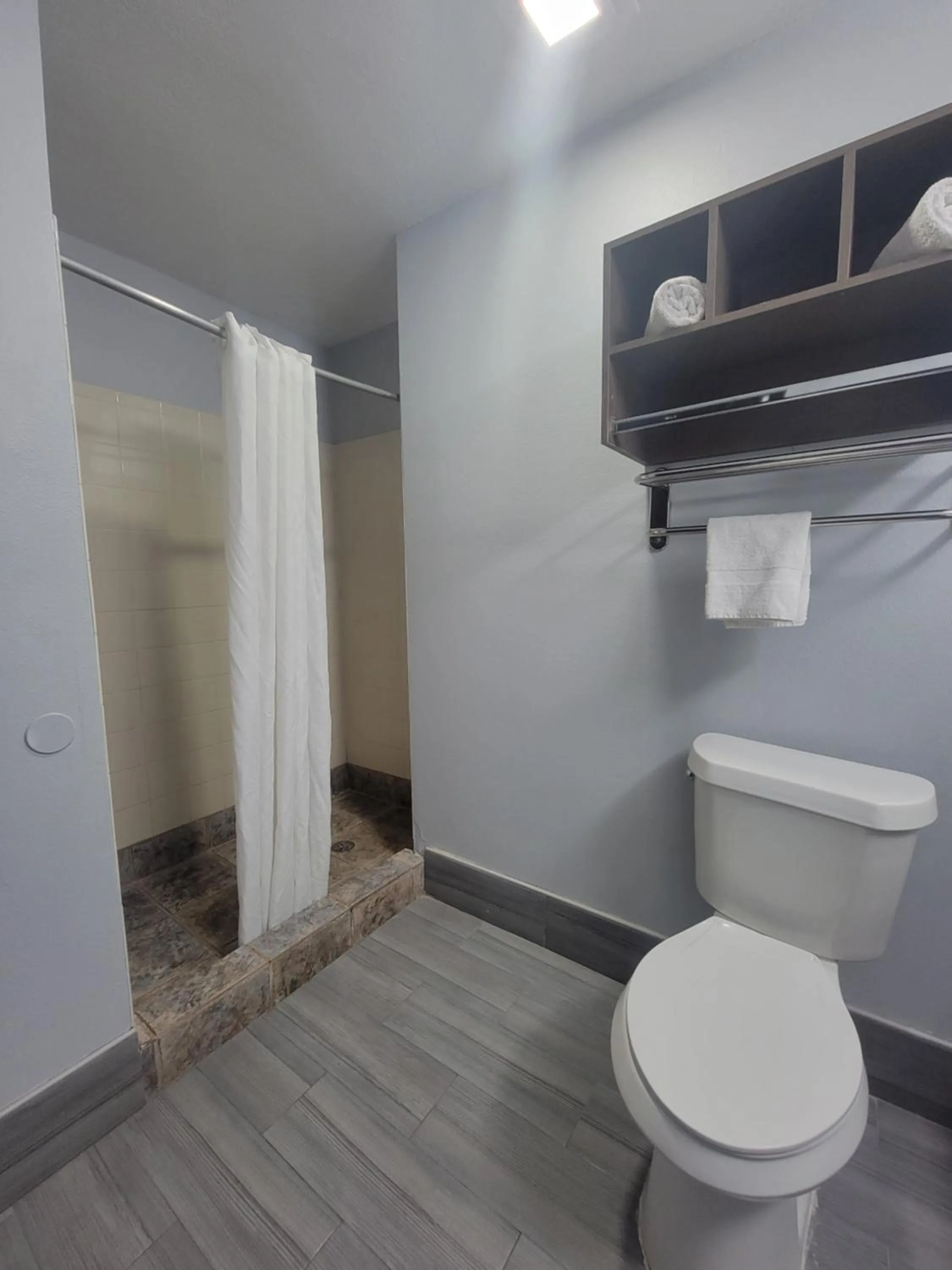 Shower in Blue Bay Inn and Suites