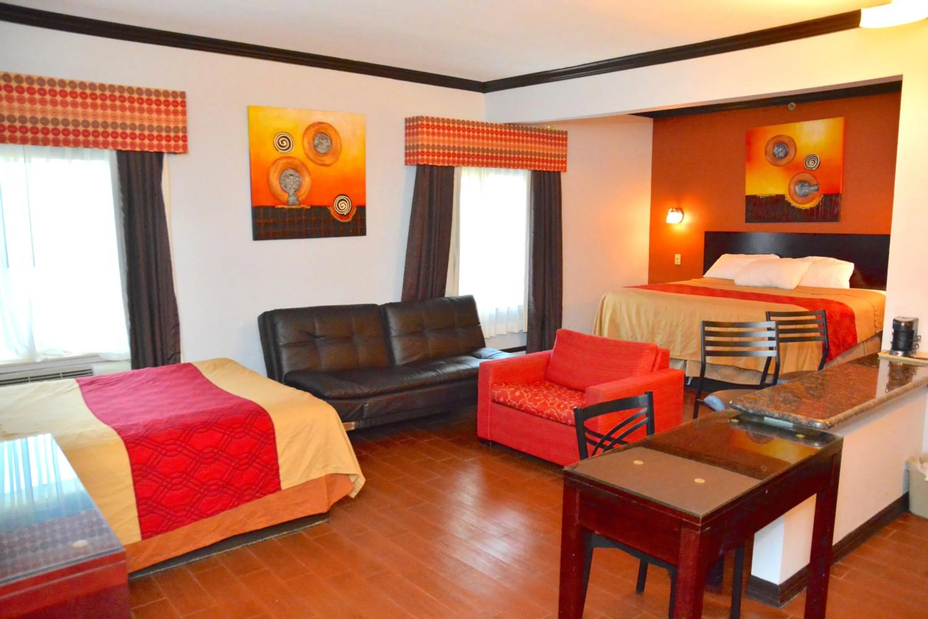 Bed in Blue Bay Inn and Suites