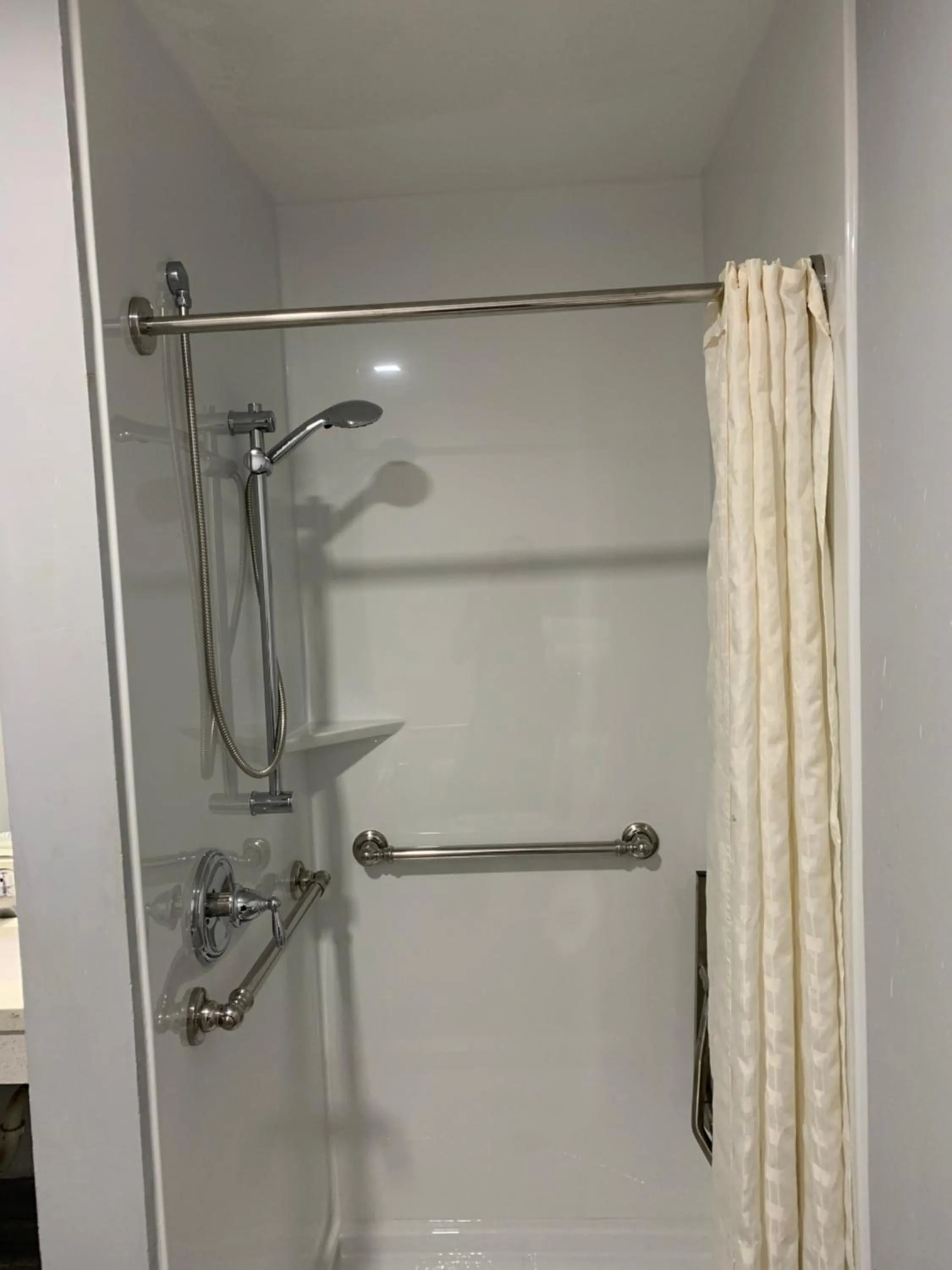 Shower in Blue Bay Inn and Suites